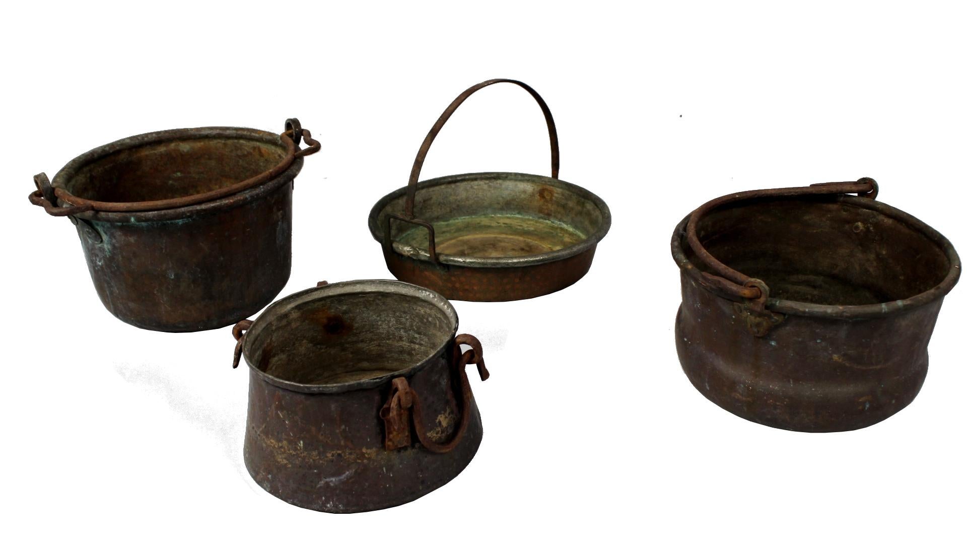 Set of four weathered copper pots, made in the 19th century. They are in original condition with patina.
Measurements:
Dm 33cm/ 13in., H 21cm/ 8.27in.
Dm 25.5cm/ 10.04 in., H 14.5cm/ 5.7in.
Dm 30.5cm/ 12in., H 14.5cm/ 5.7in.
Dm 35.5cm/