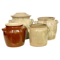 Set di quattro vasi di terracotta smaltata del XIX secolo