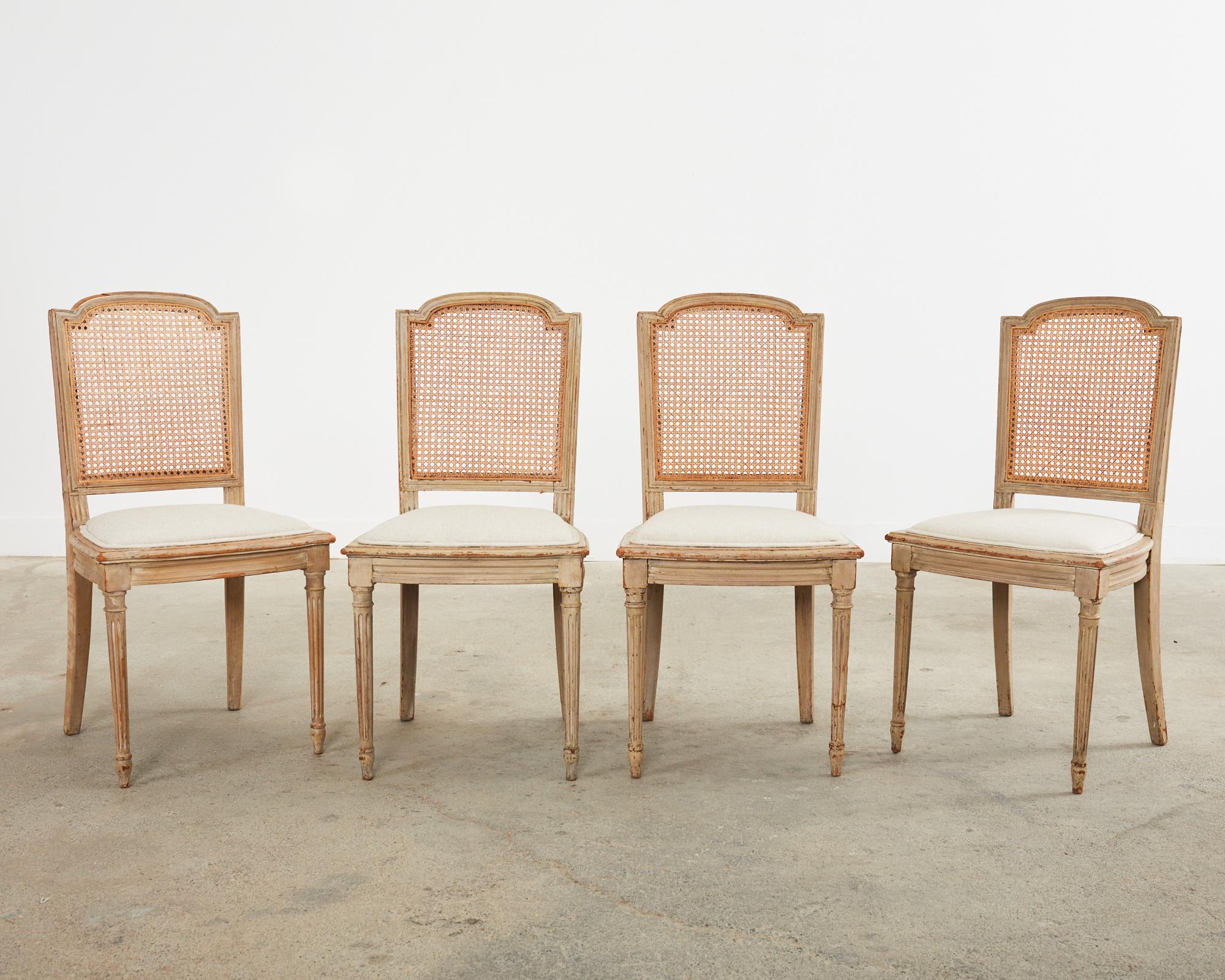 Painted 19th Century Set of Four Swedish Gustavian Caned Dining Chairs For Sale
