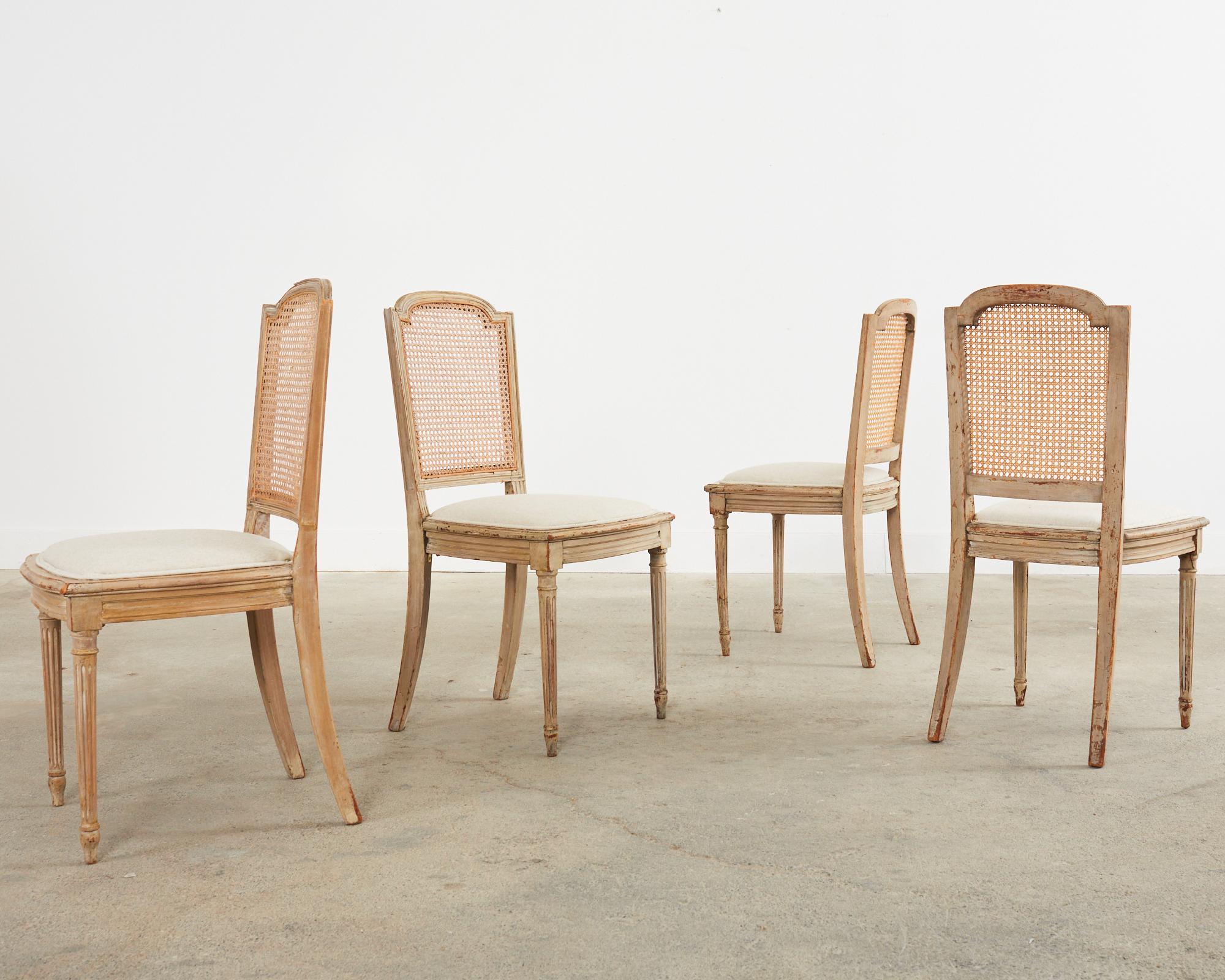 Linen 19th Century Set of Four Swedish Gustavian Caned Dining Chairs For Sale