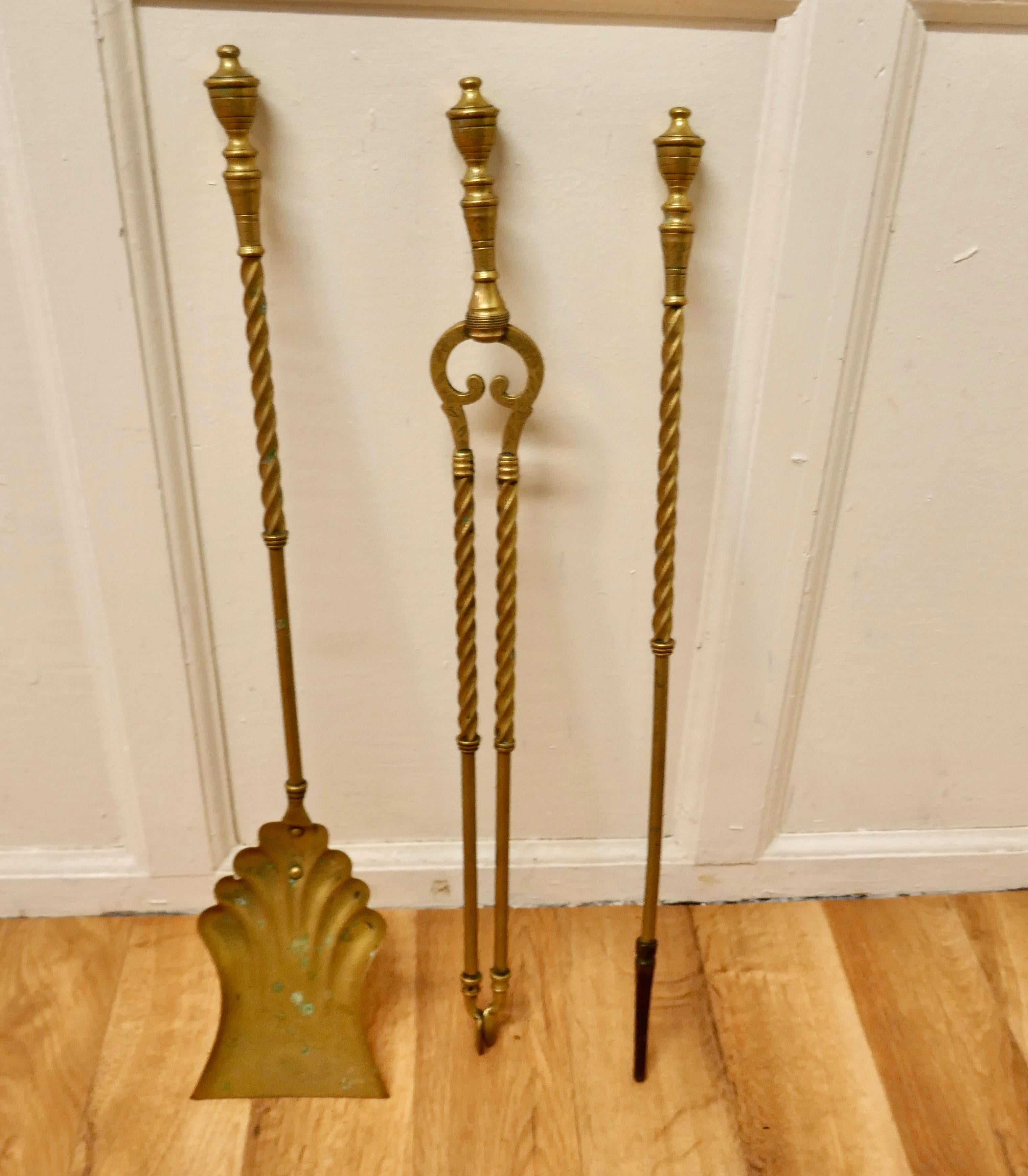 19th century set of long barley twist fireside tools

A great trio, tongs, shovel and poker
Made in Brass and in good used condition
The tools are 27” long
AC195.