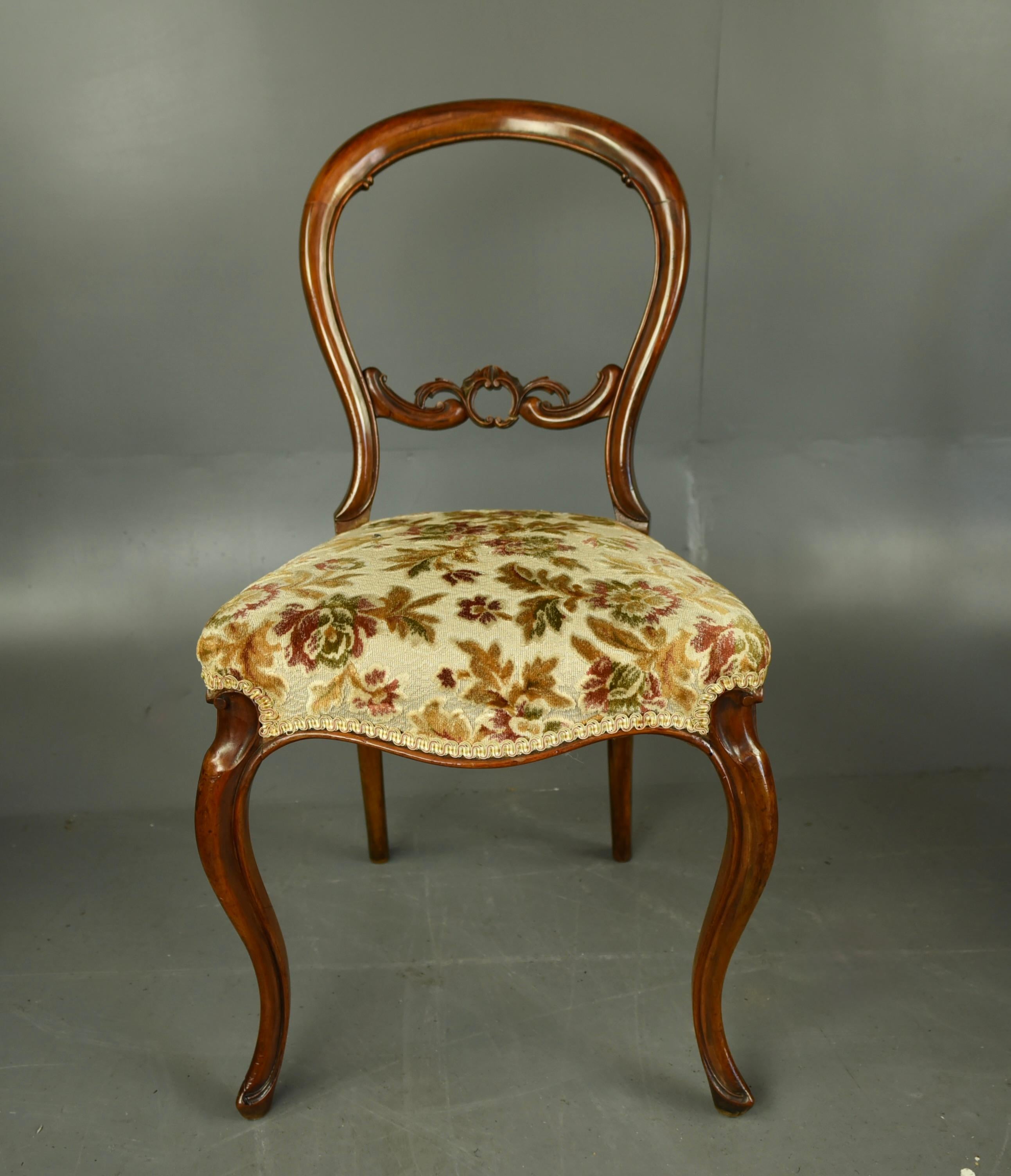 Fine set of six Victorian balloon back walnut dining chairs .circa 1860 .
The chairs are in very good condition and  are all solid in joint and woodworm free ,
They are a very elegant shape with fine cabriole front legs ,The fine shaped backs have a