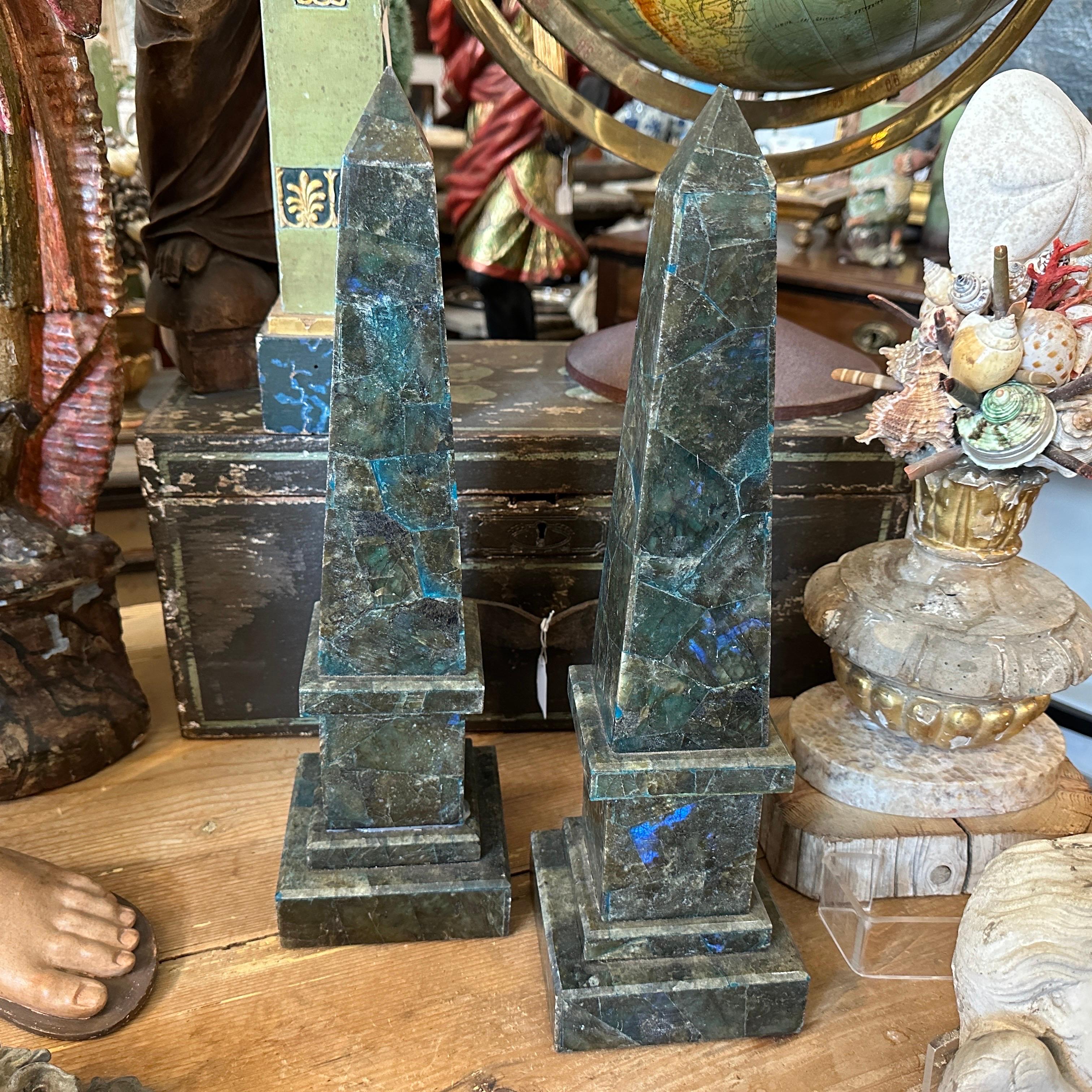 This set of two green marble and lapis lazuli assembled Italian obelisks is a stunning examples of decorative art, embodying the elegance, luxury, and craftsmanship of the era. They serve not only as decorative accents but also as symbols of wealth,