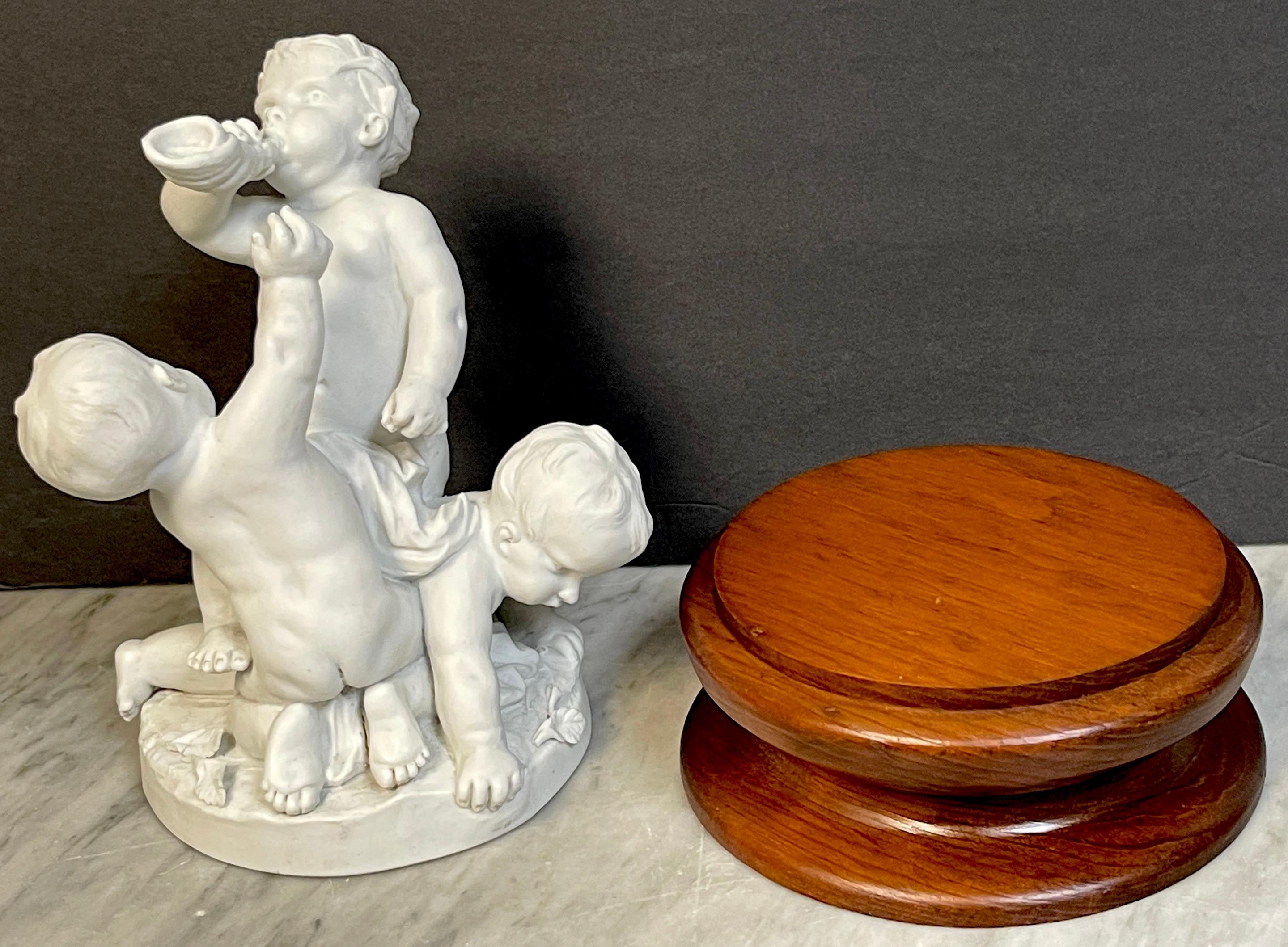 19th Century Sevres Biscuit Group of Three Frolicking Puttos For Sale 8