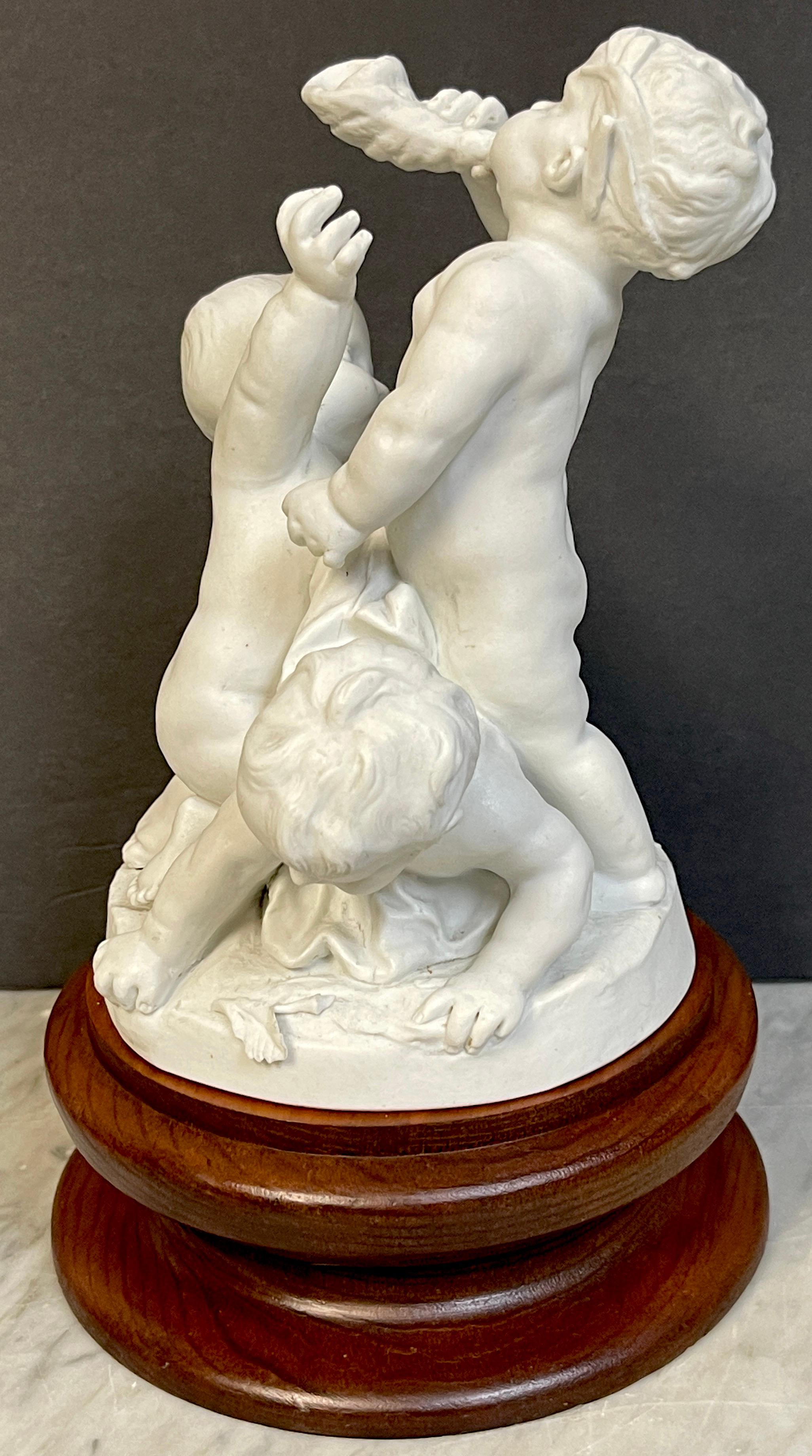 19th Century Sevres Biscuit Group of Three Frolicking Puttos In Good Condition For Sale In West Palm Beach, FL