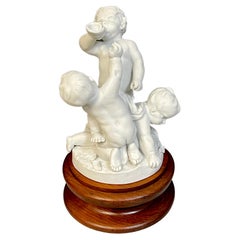 19th Century Sevres Biscuit Group of Three Frolicking Puttos