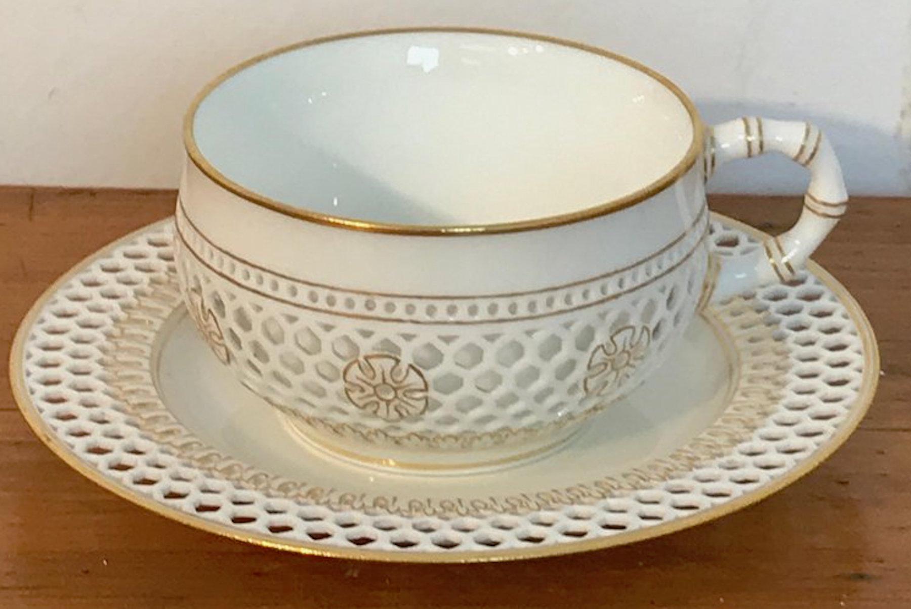 19th century Sevres reticulated cup and saucer, the double walled cup made in 1881, with 