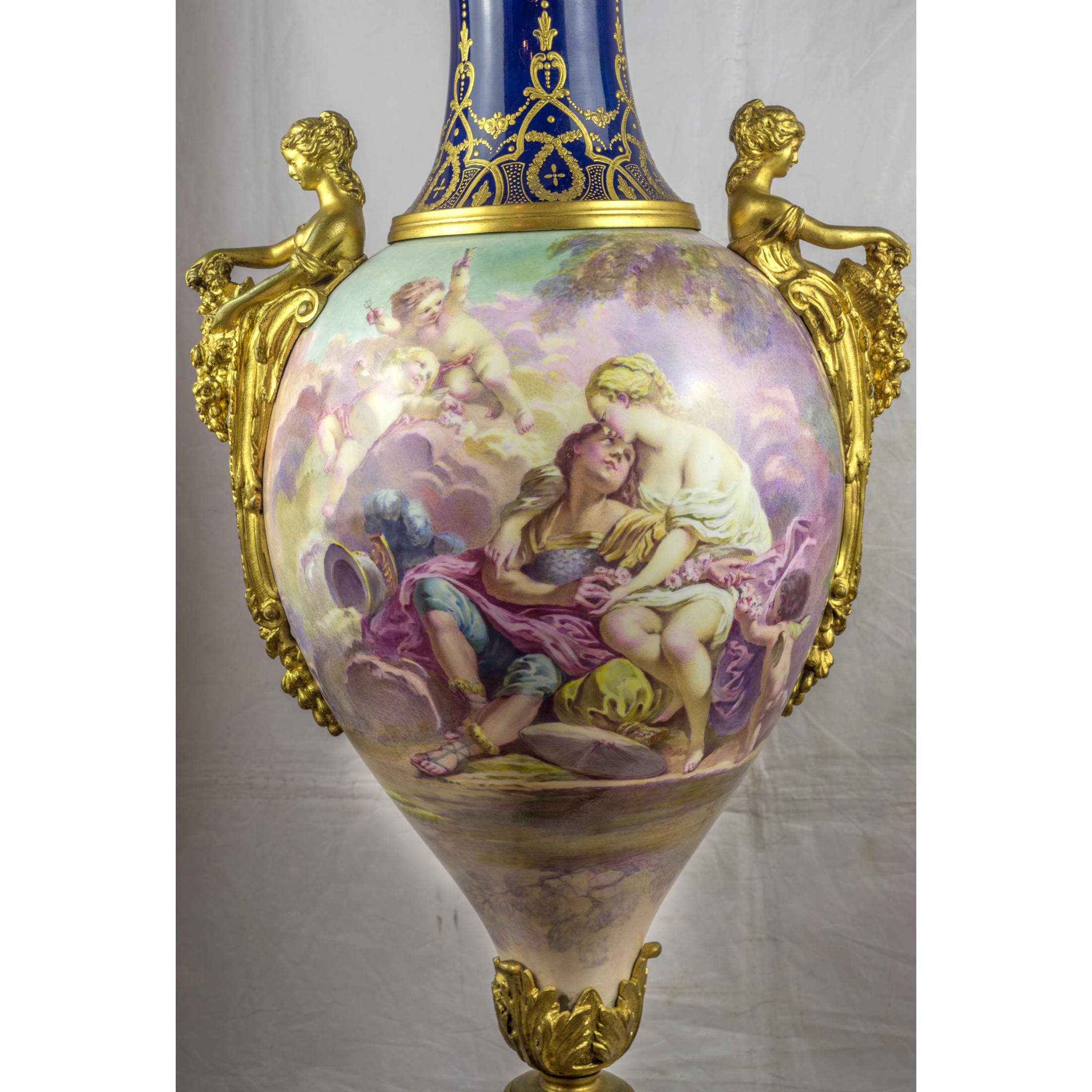 A fine quality Sèvres style porcelain and gilt bronze-mounted vase and Cover.
Hand painted continuous allegorical figural scene, signed Maxant

Origin: French
Date: circa 1860
Dimension: 45 in x 15 1/2 in.