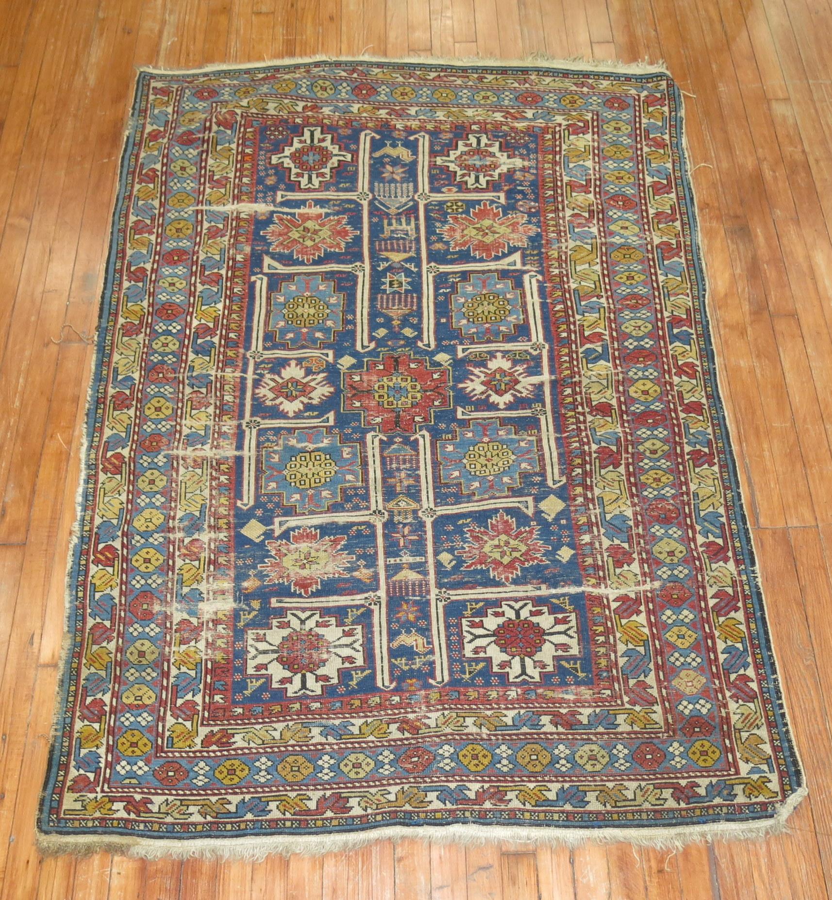 A geometric tribal looking Caucasian Shirvan rug from the late 19th century. Colorful geometric design on a navy blue field.

Measures: 4'3