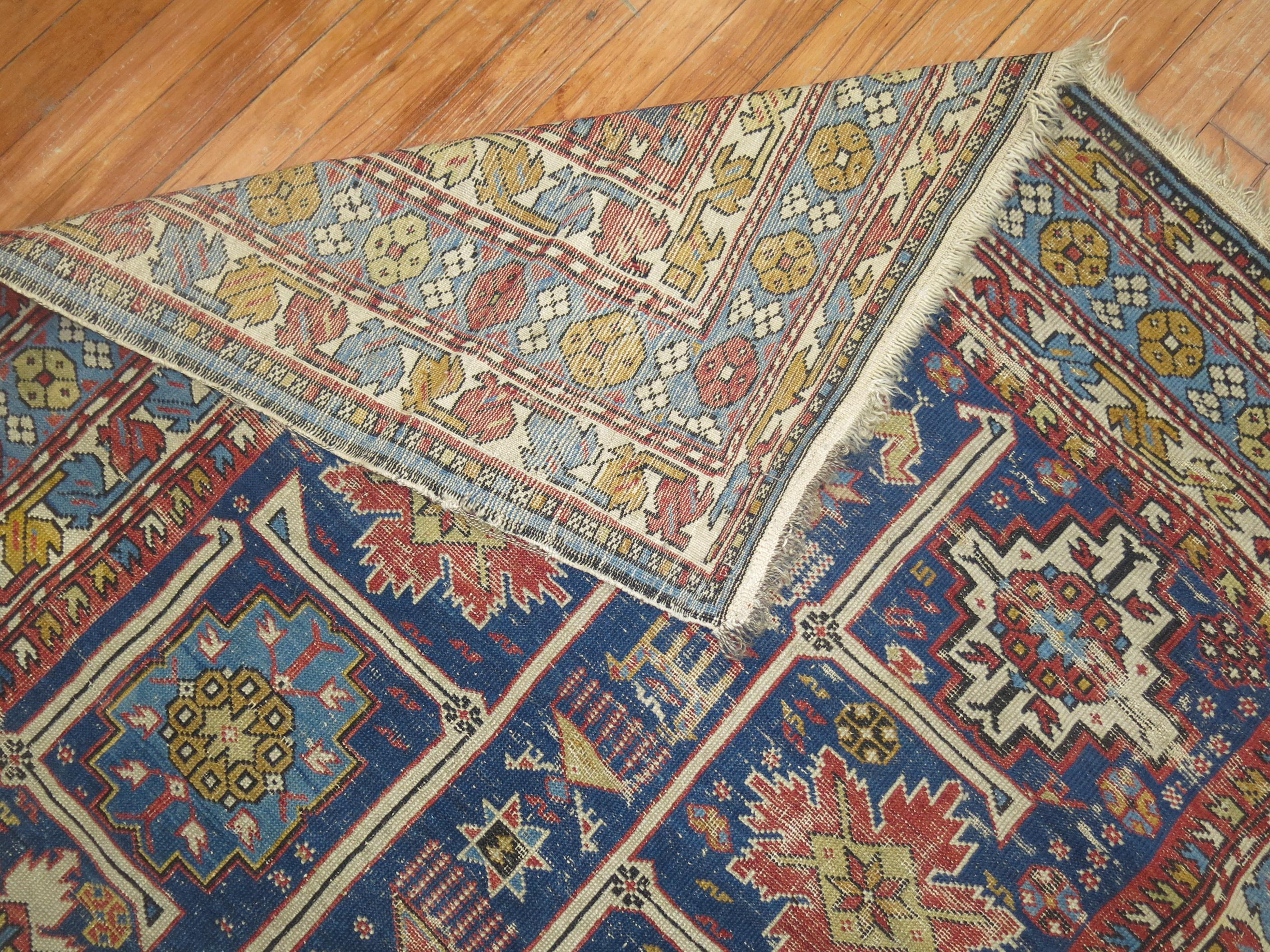 19th Century Shabby Chic Geometric Tribal Antique Shirvan Rug In Distressed Condition In New York, NY