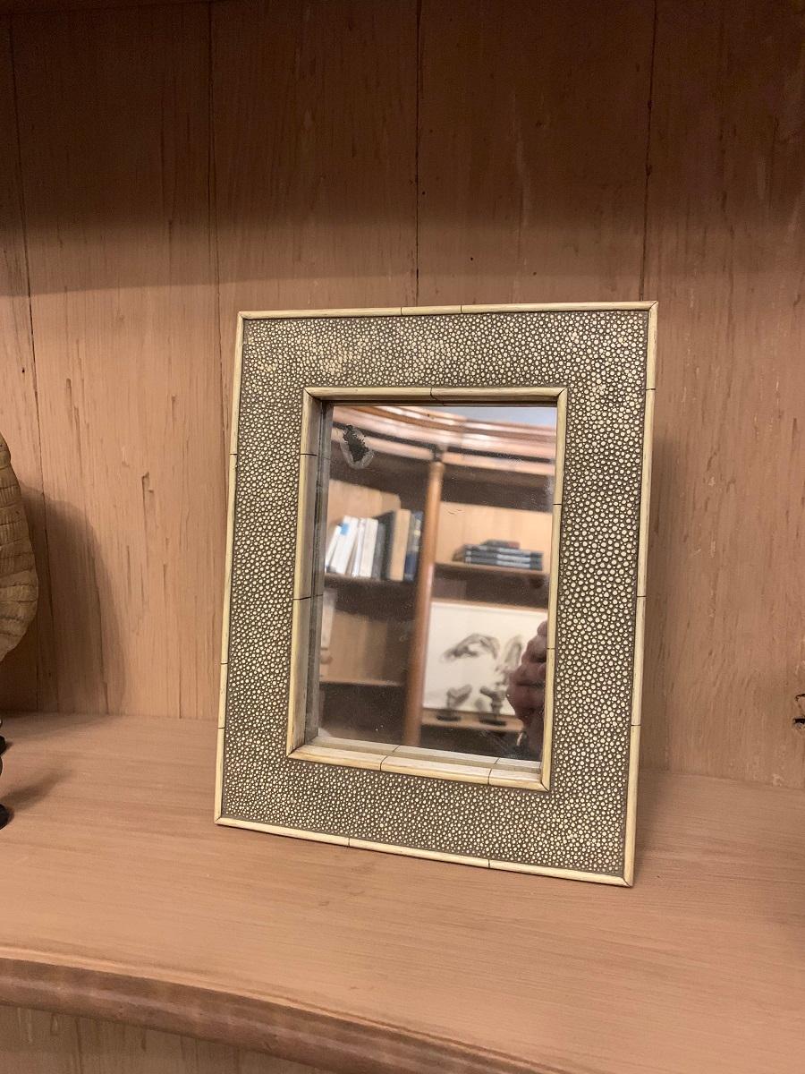 A 19th century French Shagreen and bone mirror. Of small proportions and with stand.