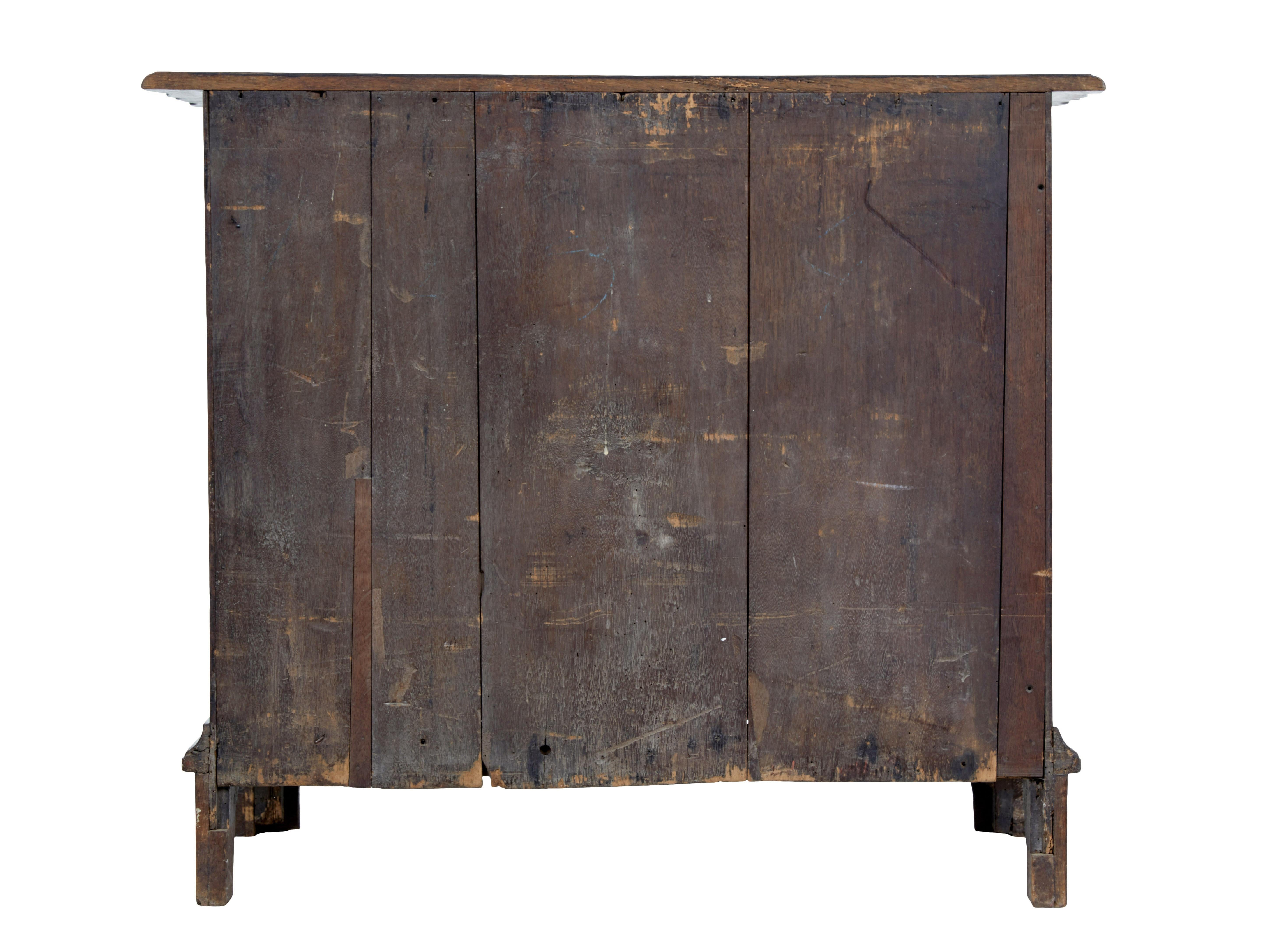 Swedish 19th Century shaped front oak chest of drawers For Sale