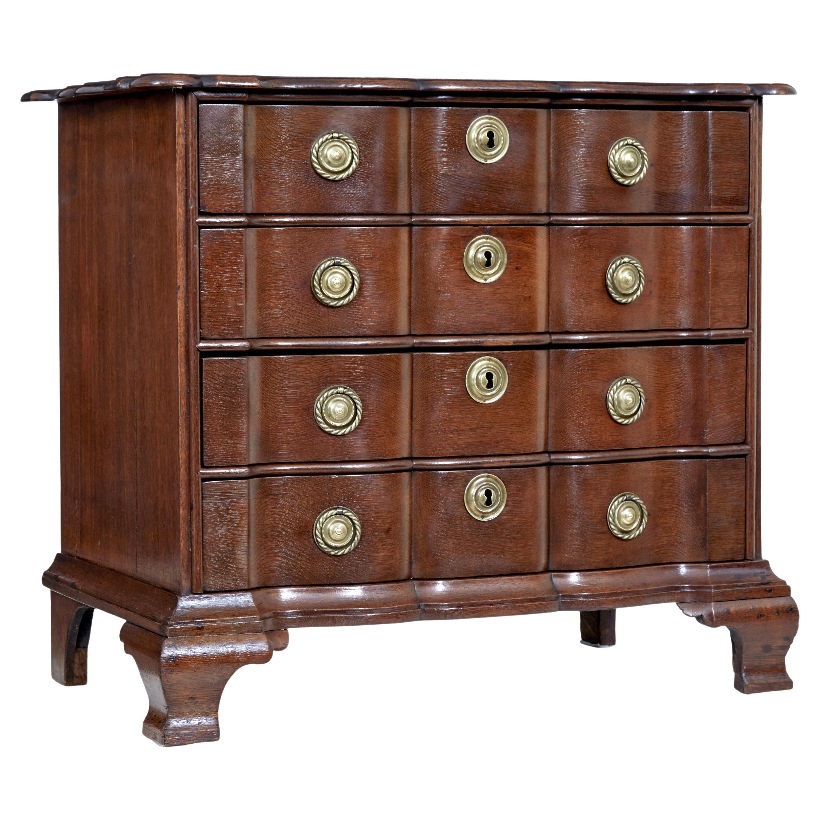 19th Century shaped front oak chest of drawers For Sale
