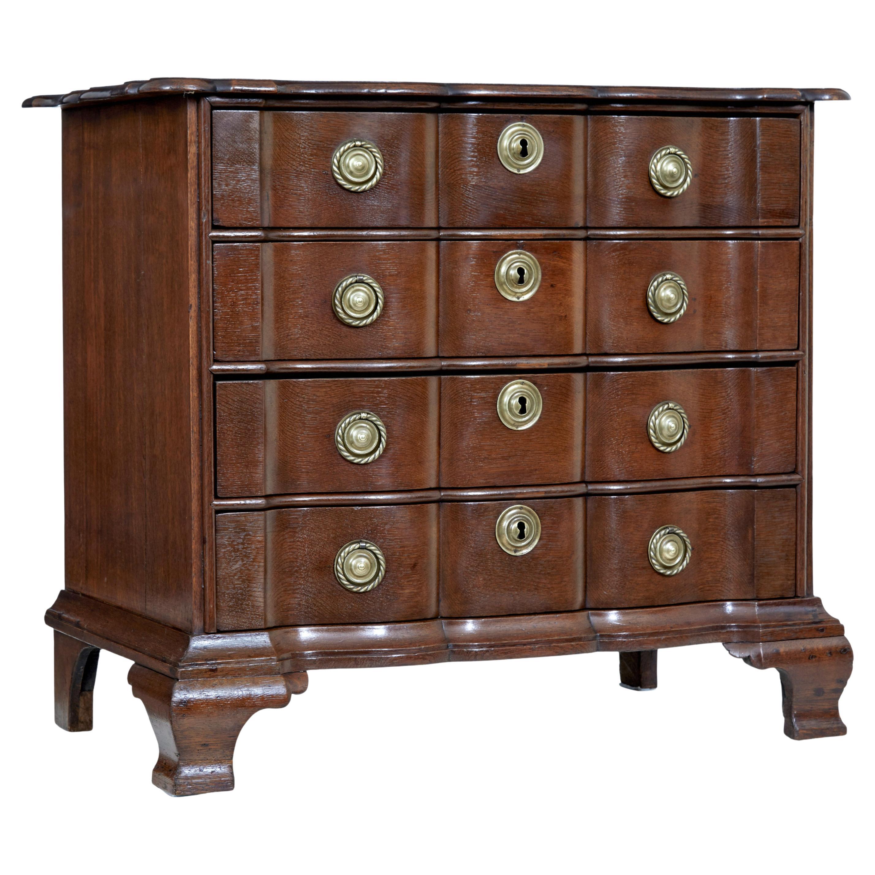 19th century shaped front oak chest of drawers For Sale