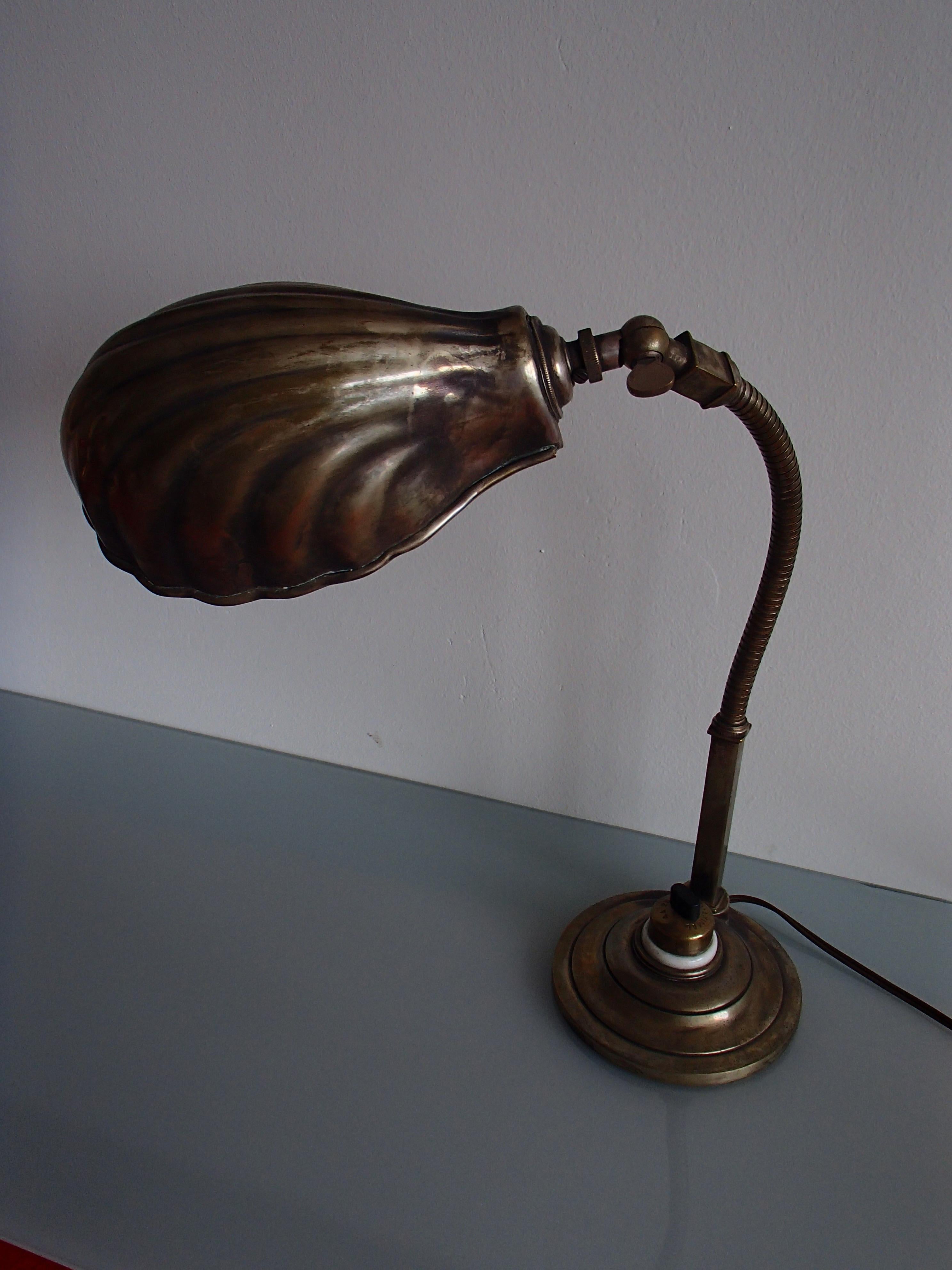 19th century shell table lamp with flexible neck.