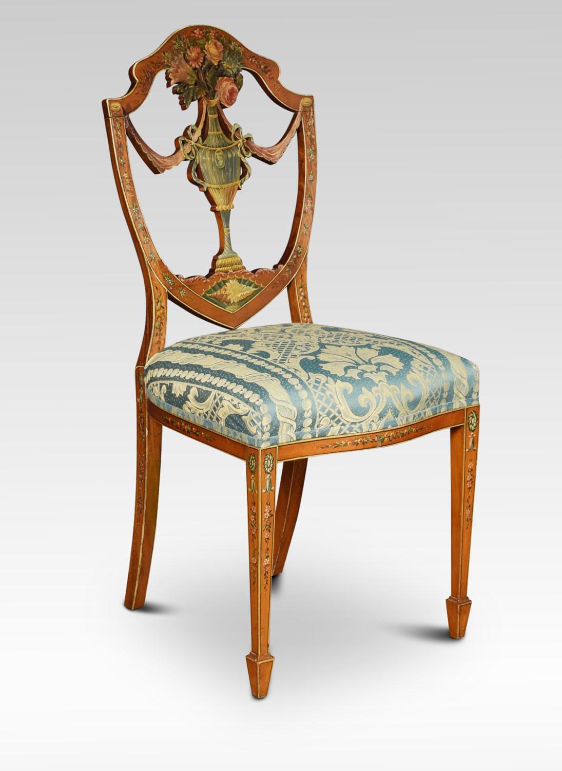 Late 19th century Sheraton revival satinwood side chair, painted overall with flowers and leaves, the shield shaped back with pierced splat above padded seat all raised up on tapering legs terminating in spade feet.
Dimensions:
Height 38 inches