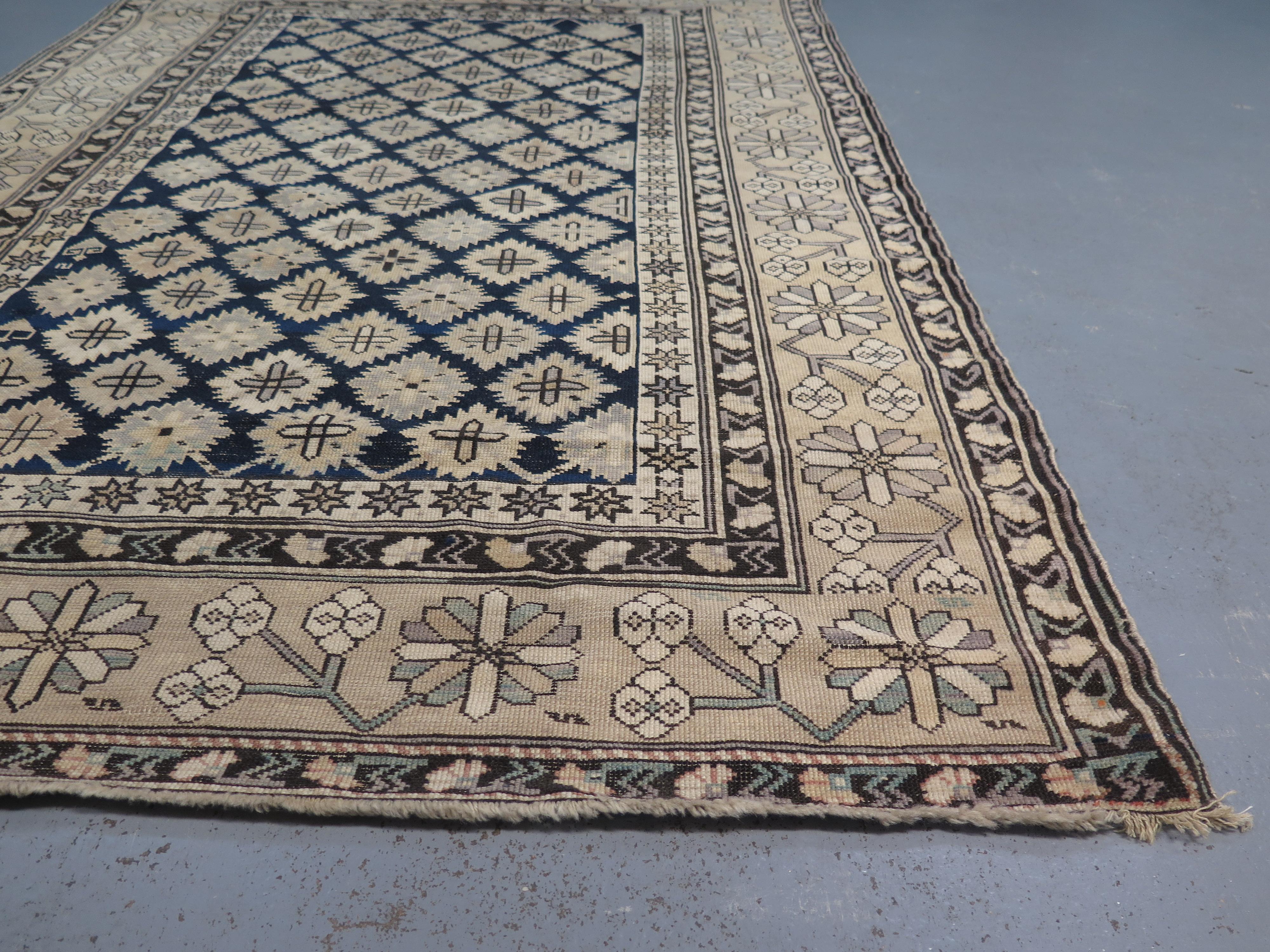 Antique Shirvan rugs are among the most highly sought-after Caucasian weavings, renowned for a nuanced, complex style that sets them apart from other rugs from the region. These pieces are extraordinarily finely woven, showcasing richly detailed