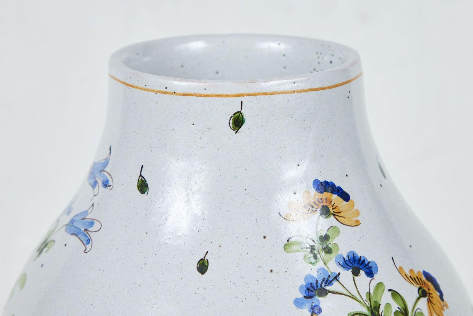 A rare, period, hand-painted and glazed, Sicilian ceramic urn in the double gourd style. Featuring wonderful vignettes of figures, birds and butterflies amidst orange trees and flowers.