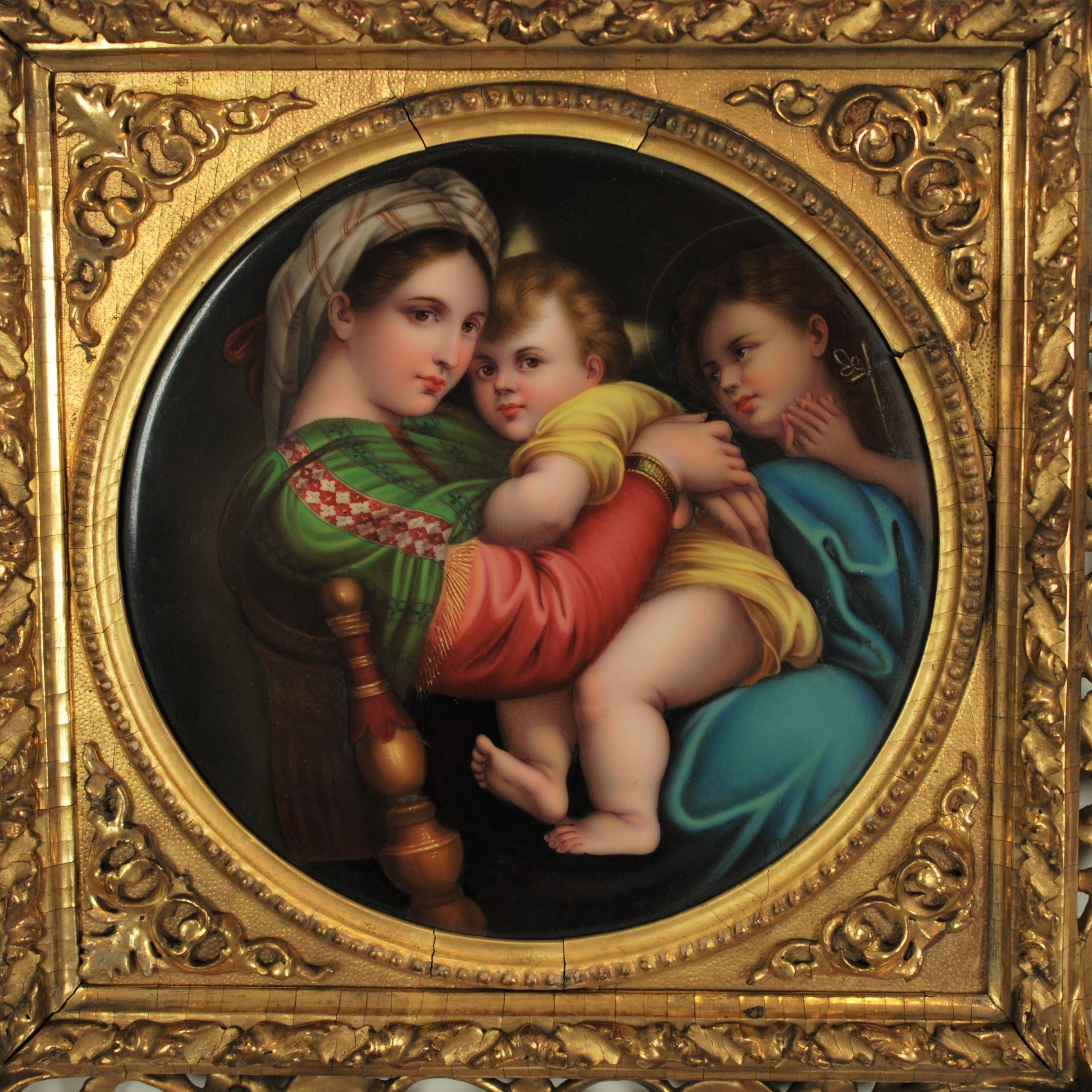 This outstanding hand painted 19th century round porcelain plaque is after Raphael's Renaissance masterpiece Madonna Della Seggiola. The artwork depicts an intimate scene featuring the Virgin Mary seated in a chair while embracing the baby Jesus in