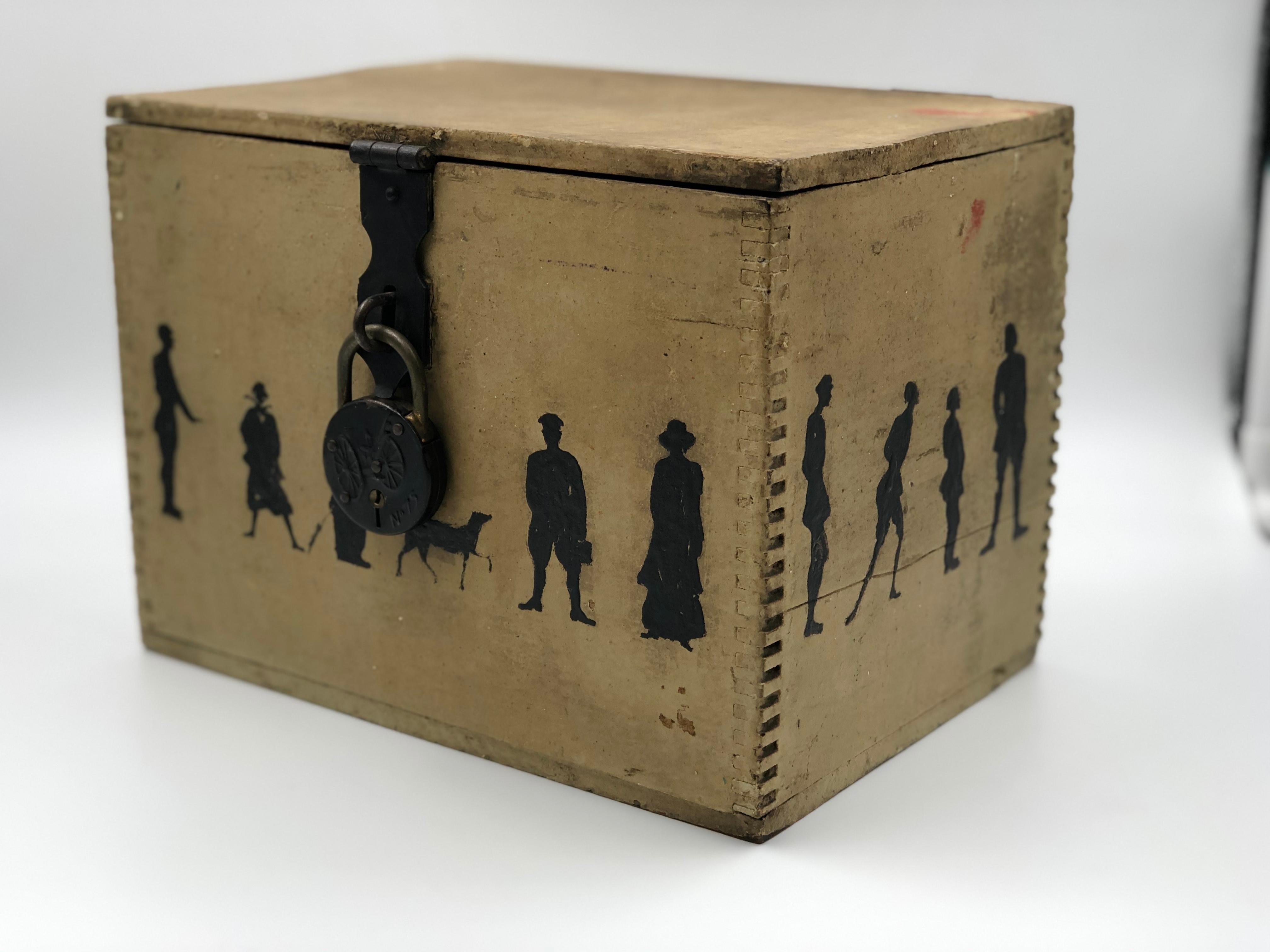 Charming late 19th century handmade decorative box with miniature dovetail corners. The box was probably originally painted cream with the color fading to tan over time. Silhouettes of ladies, gentlemen, children, a dog, and a goat are illustrated