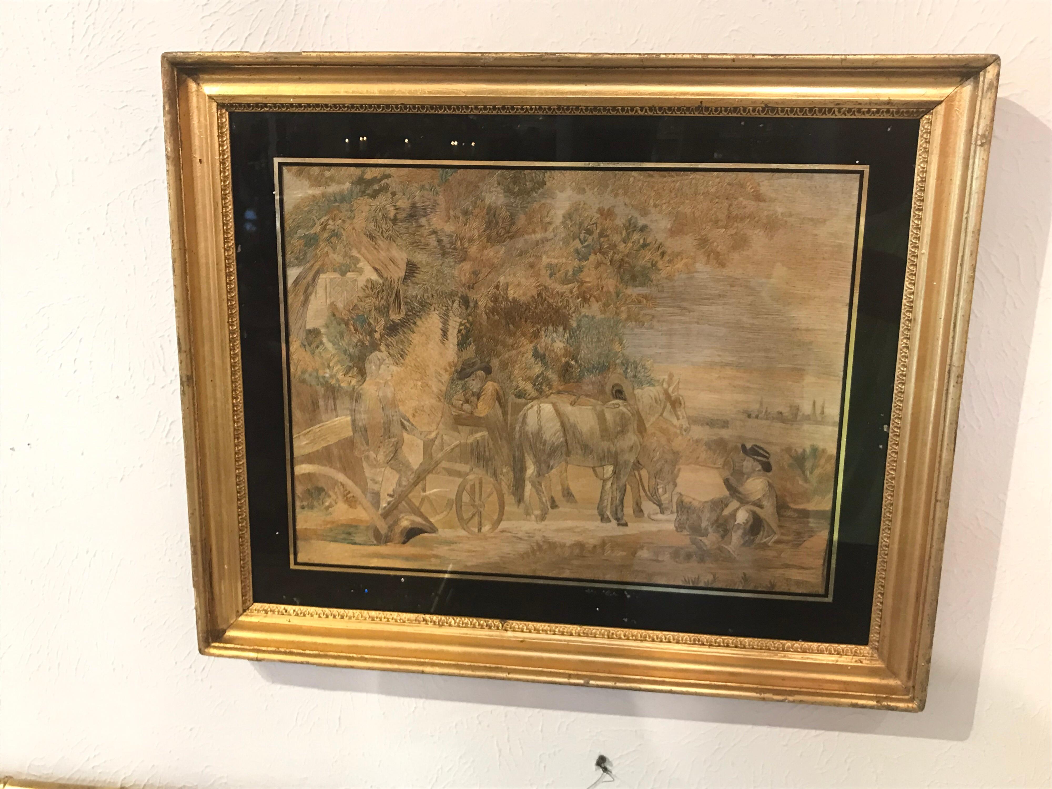 Very decorative antique silk embroidery depicting figures with a horse drawn carriage. Nicely framed in gold leaf over wood frame, with protective glass. A wonderful accessory for any Fine home. Please reach out with any questions.