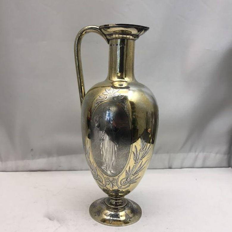 19th century silver and gilt ewer with matching goblets. A superb antique sterling silver wine jug with a shaped vase form on rounded foot. Fantastic quality from top to toe, just as you’d expect from this well known silver maker. Both the goblets