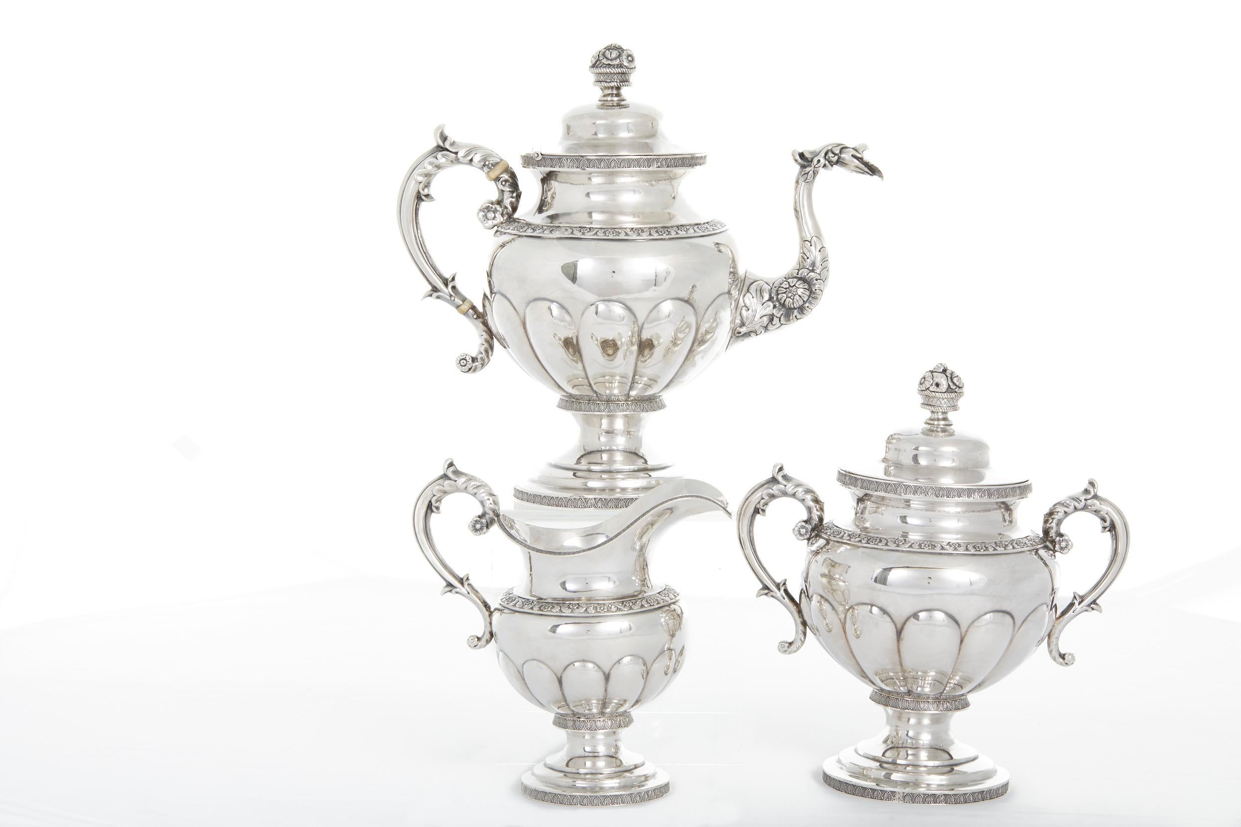 Beautiful American coin silver 3 -piece tea and coffee service in the manner of Thomas Whartenby Pennsylvania, Circa 1816-1818.
Thomas Whartenby and Peter Bumm were independently successful silversmiths in Philadelphia who worked together to create
