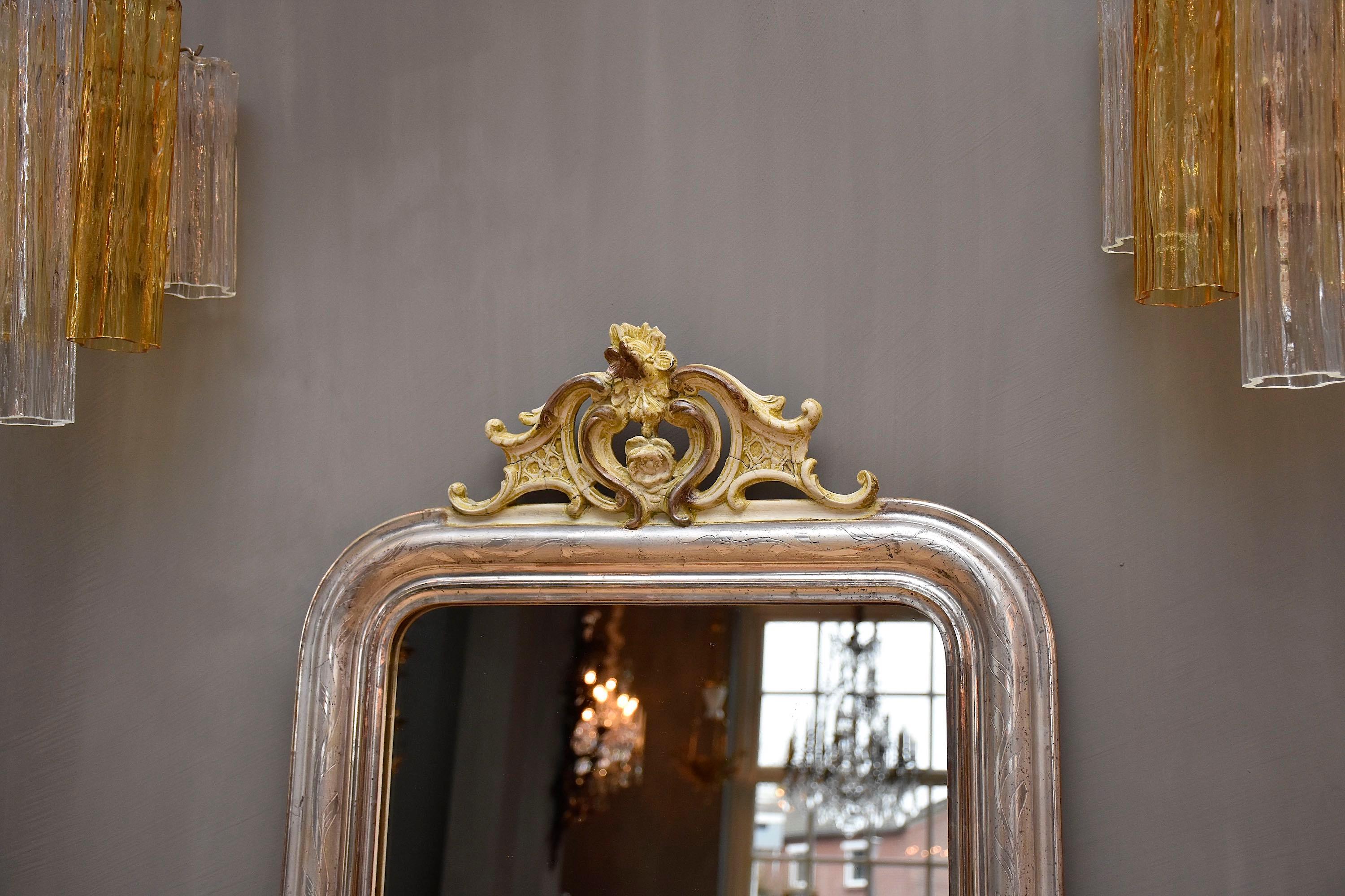 Louis Philippe 19th century silver leaf gilt French mirror with a crest For Sale