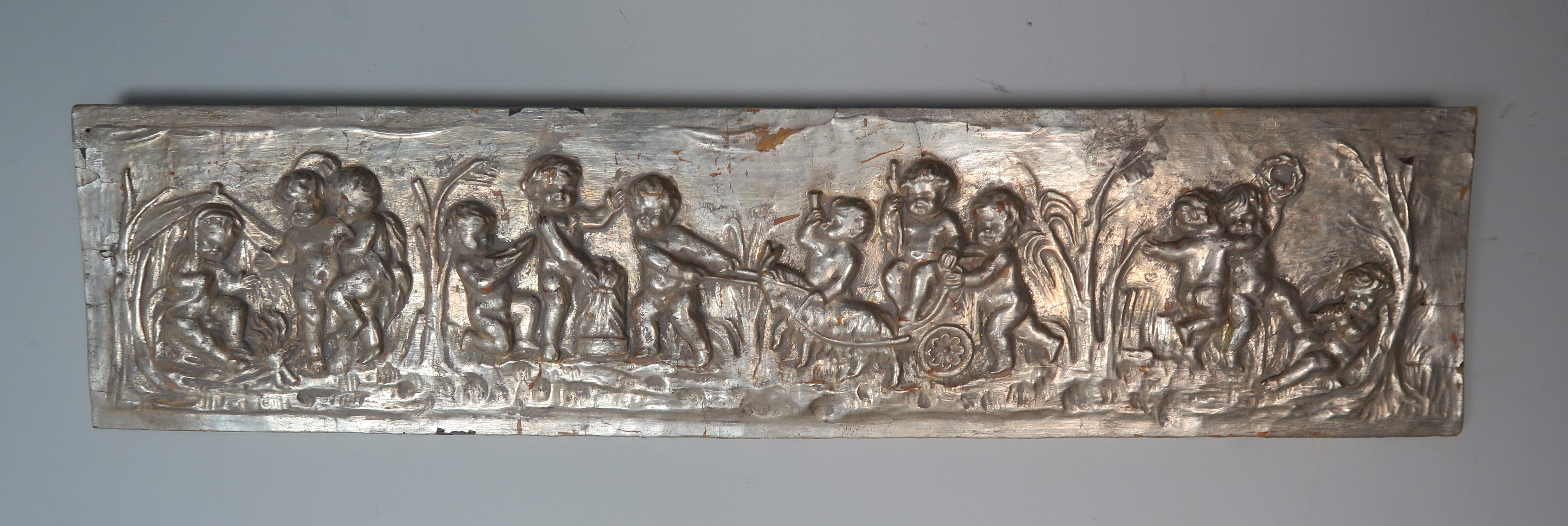 19th century silver gilt carved wood panel depicting a dozen cherubs in four scenes (the four seasons possibly).