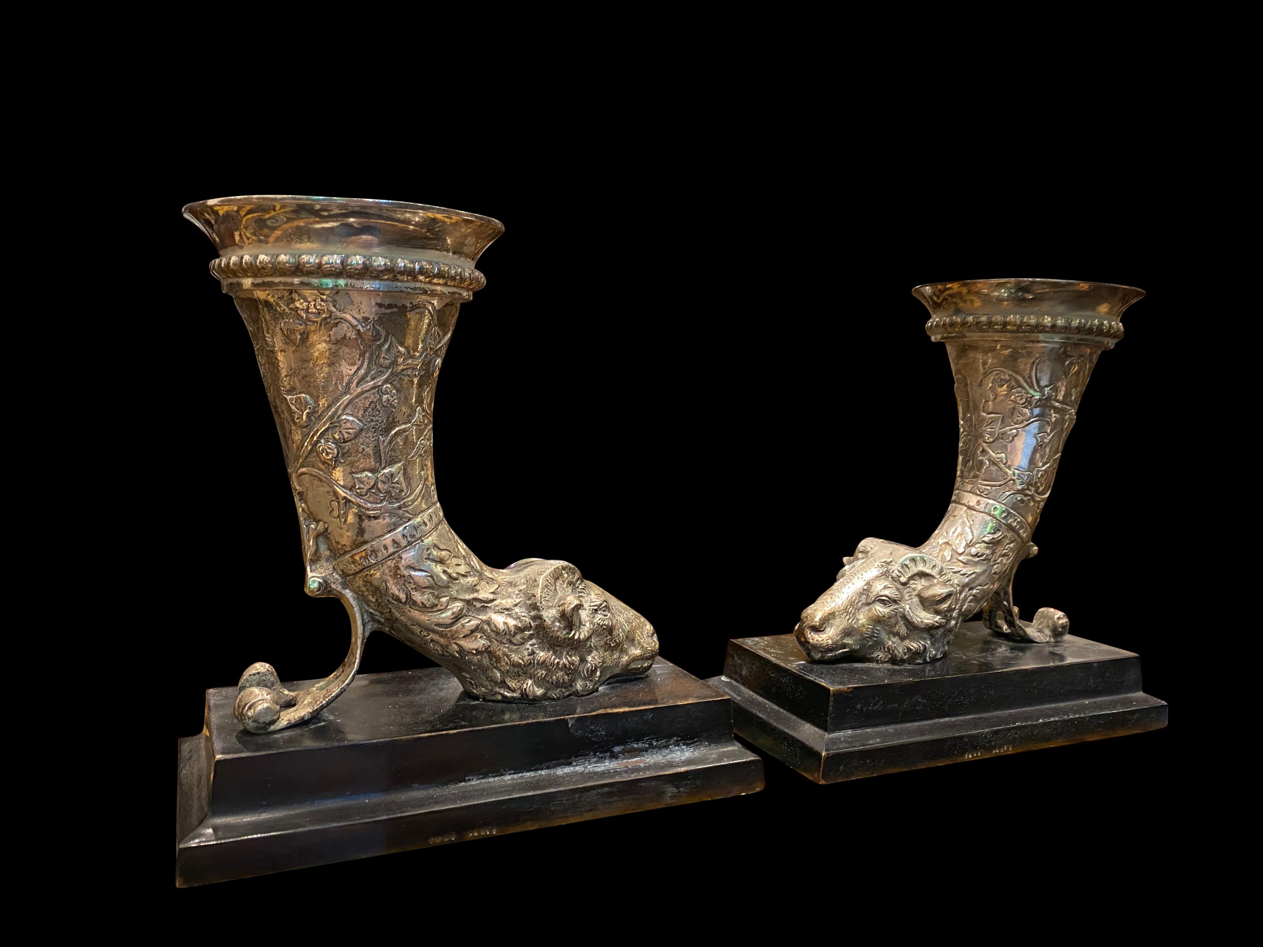 An extraordinary pair of 19th century silver plated ram head book ends. Fantastic decorated pieces, situated on black marble bases. Floral engravings with fantastic detail.
