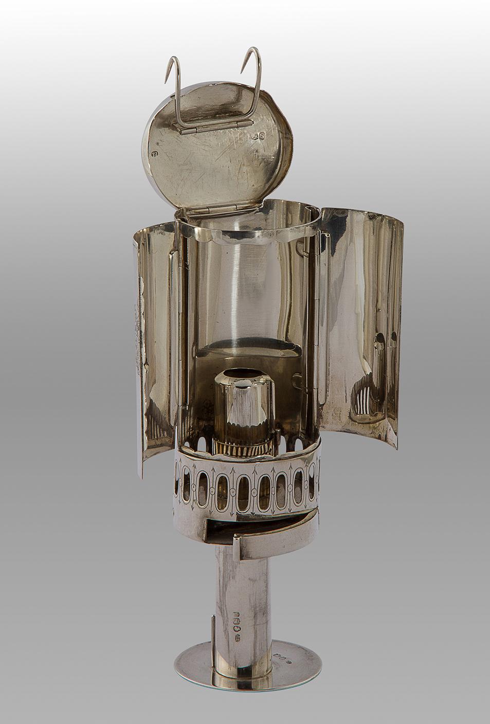 A very good silver travel or carriage lamp by Thomas Johnson.
As with most English travel and campaign pieces, the design is ingenious, the purpose being to create a completely practical item that will withstand the rigors of travel in 19th century