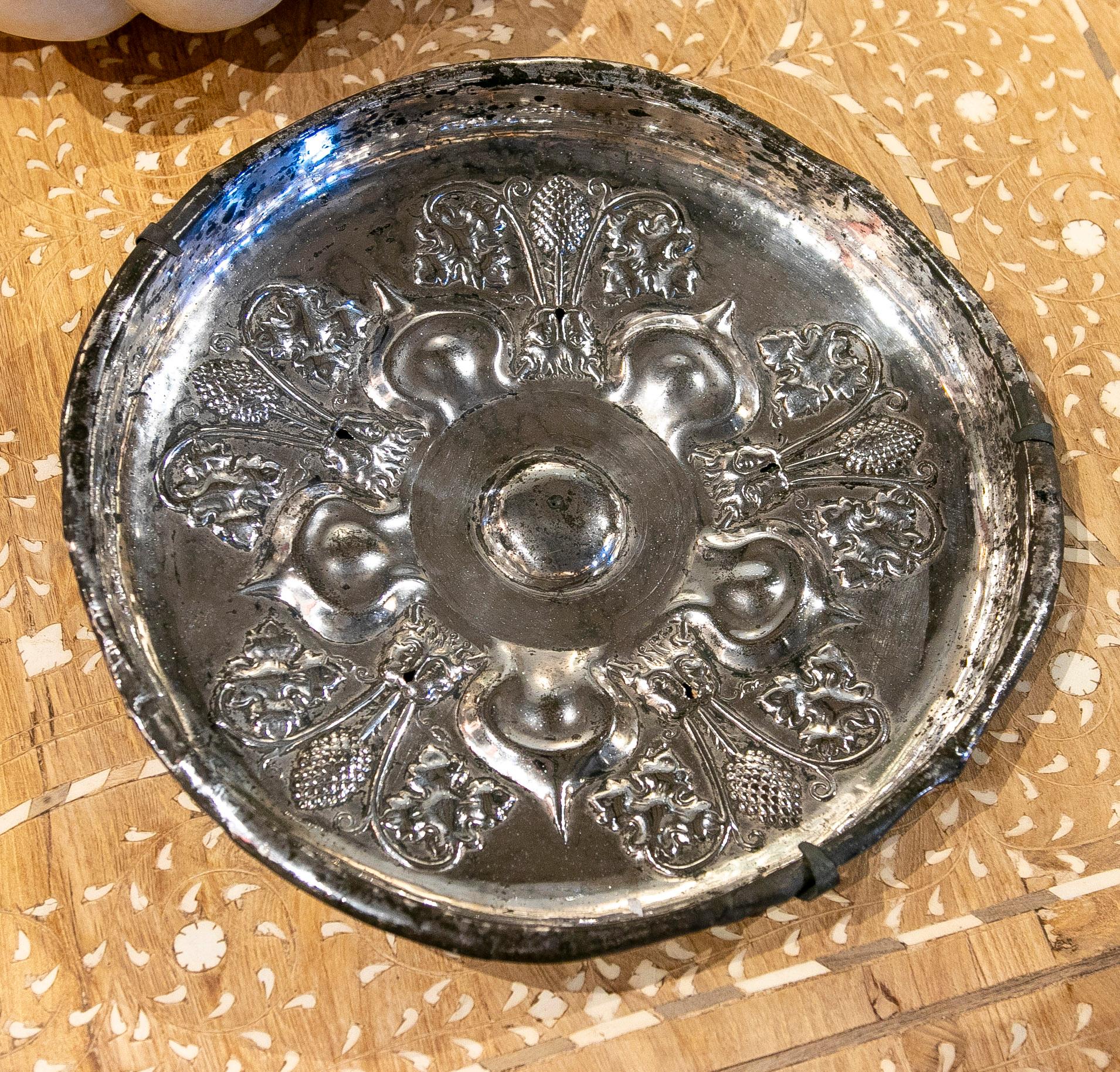 Italian 19th Century Silvered Metal Plate with Flower and Face Decoration For Sale