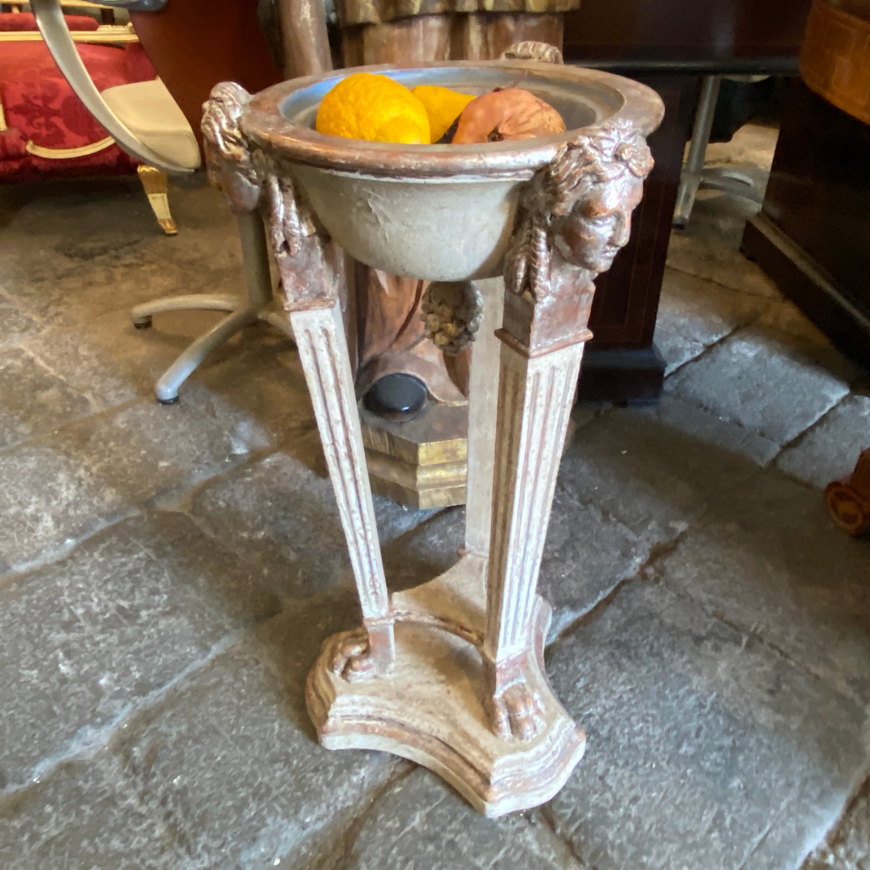 A rare silvered hand-carved wood tripod, used as a centerpiece or a fruit bowl.