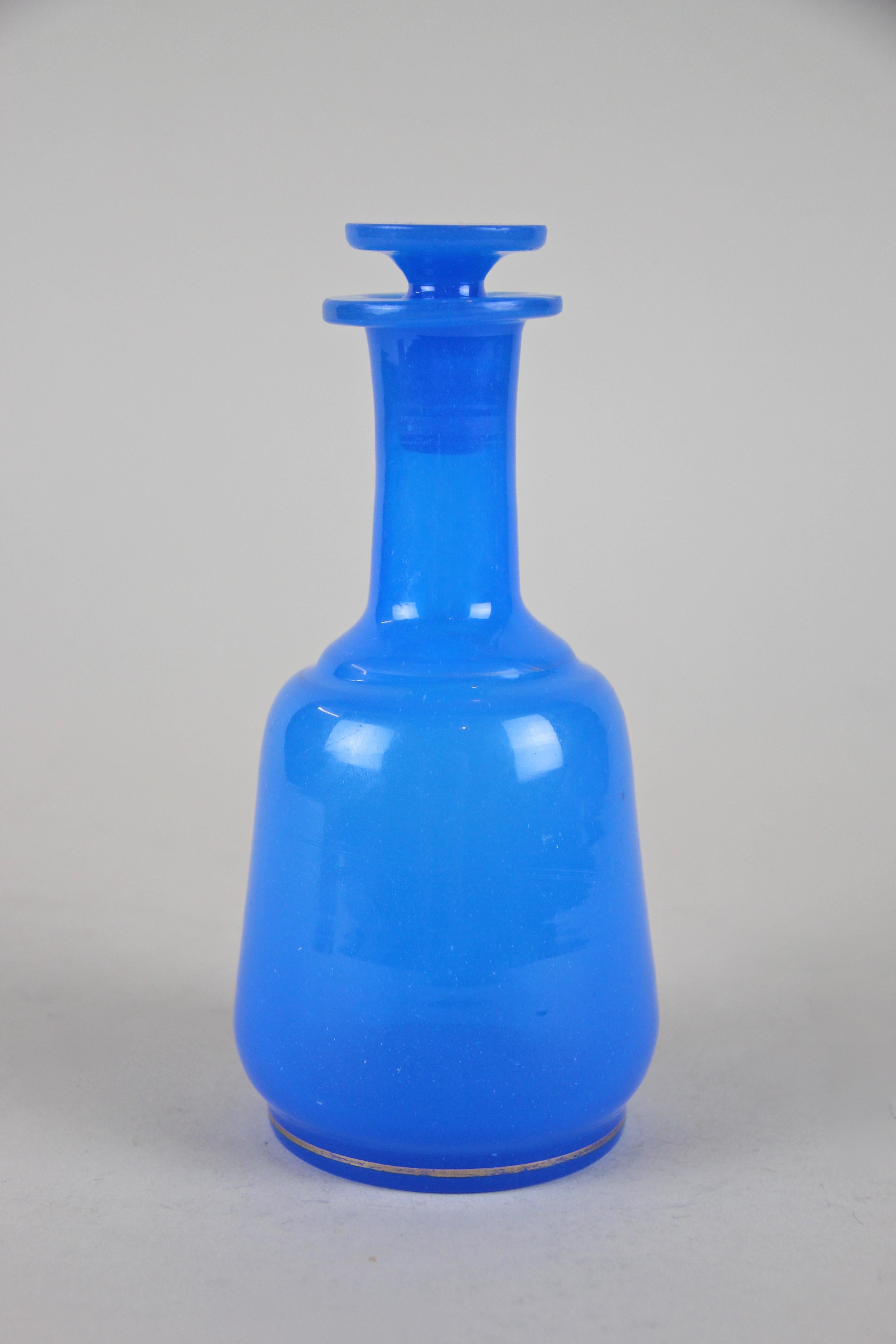 Blown Glass 19th Century Sky Blue Glass Bottle Biedermeier Mouth Blown, Austria, circa 1840