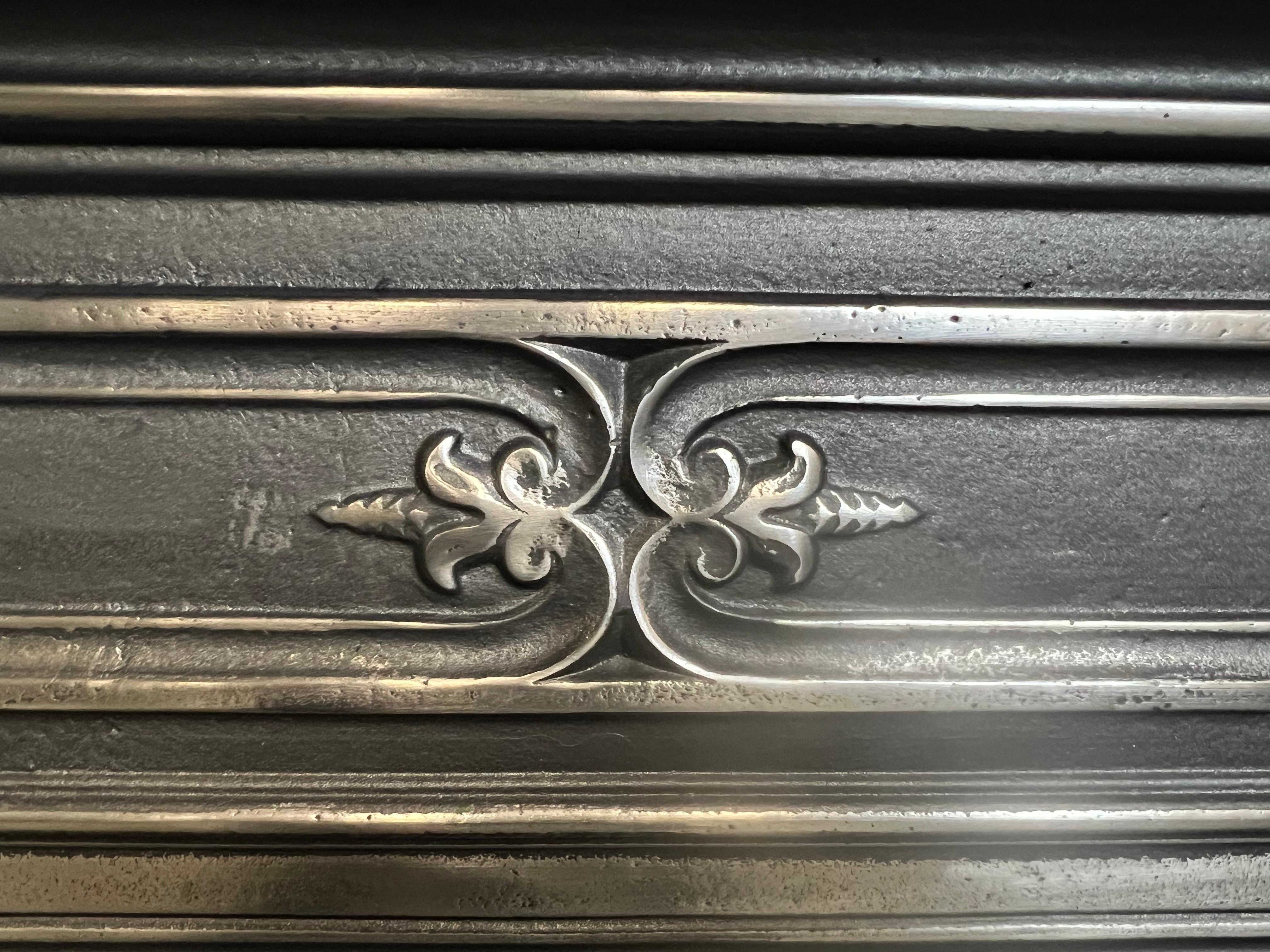 19th Century Small Cast Iron Fireplace Mantlepiece.
Original Victoaian Small Cast Iron Combination Fireplace Mantelpiece & Insert.
Traditional Backened Finish.
Recently Salvaged From A London Town House.

Shelf Width 35