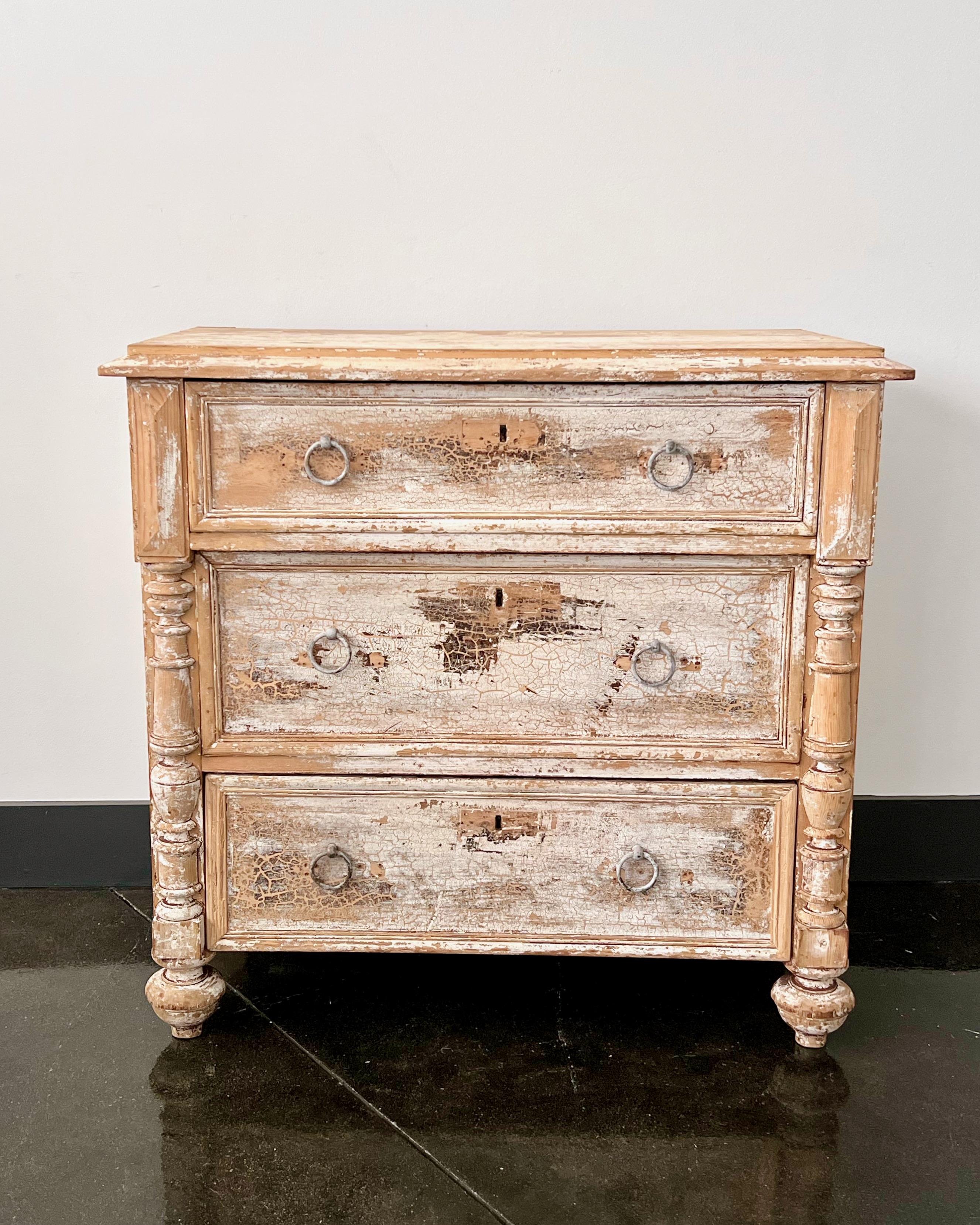 A charming small 19th century Dutch commode with three molded drawer fronts and richly carved side posts in most of original traces of fragment paint, on bun feet.
Netherlands circa 1860