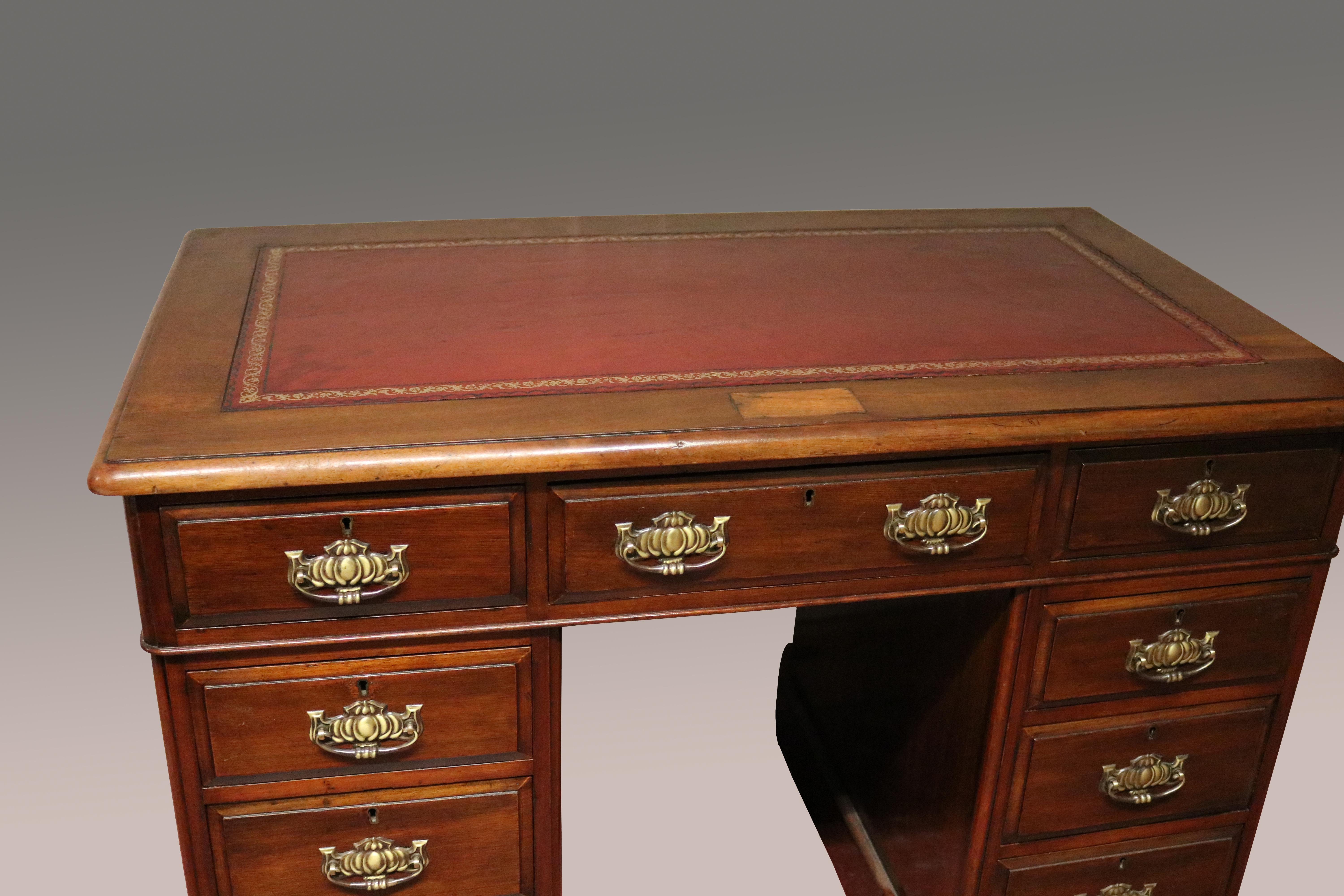 There are three drawers in the frieze and tohe top is raised upon twin pedestals, each with three drawers.

Sizes:
Width 42 inches
Depth 23 inches
Height 30 inches.