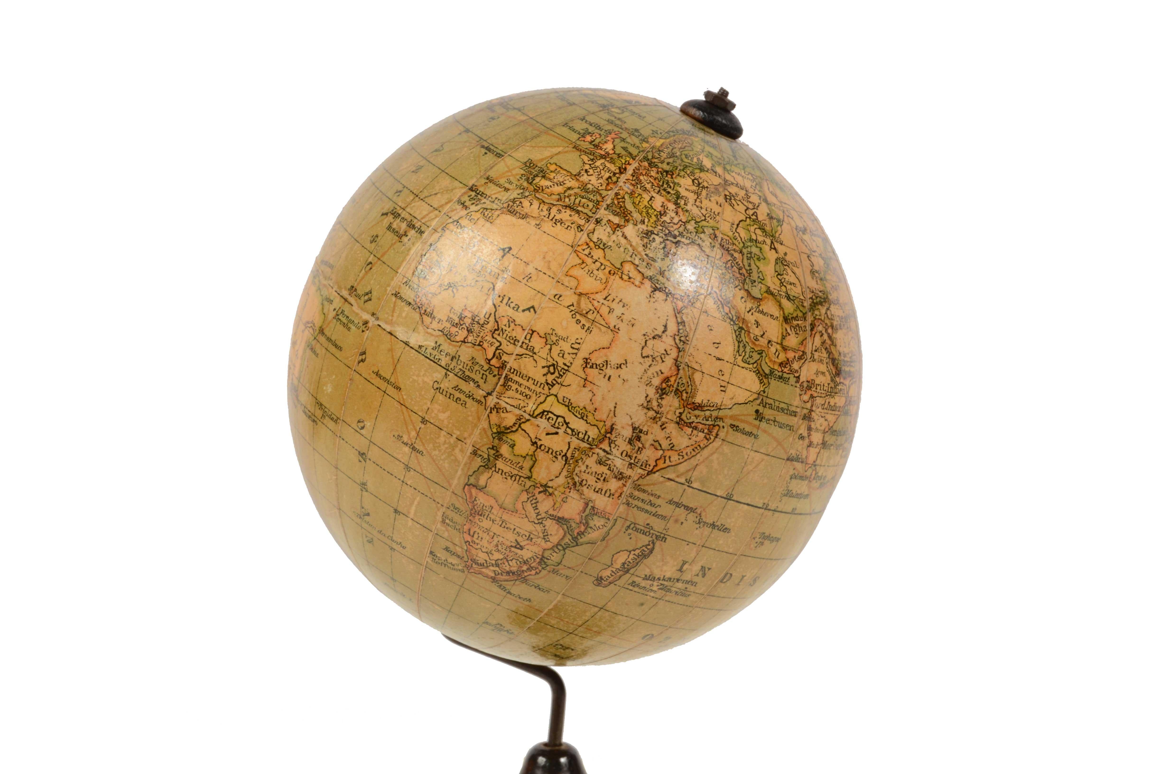 Terrestrial globe edited by Prof. Arthur Krause the German geographer, end of the XIX century. There are territorial map and commercial routes. 
Turned wooden base, papier maché sphere covered by printed paper lunes. 
Good condition. Height cm 28 -