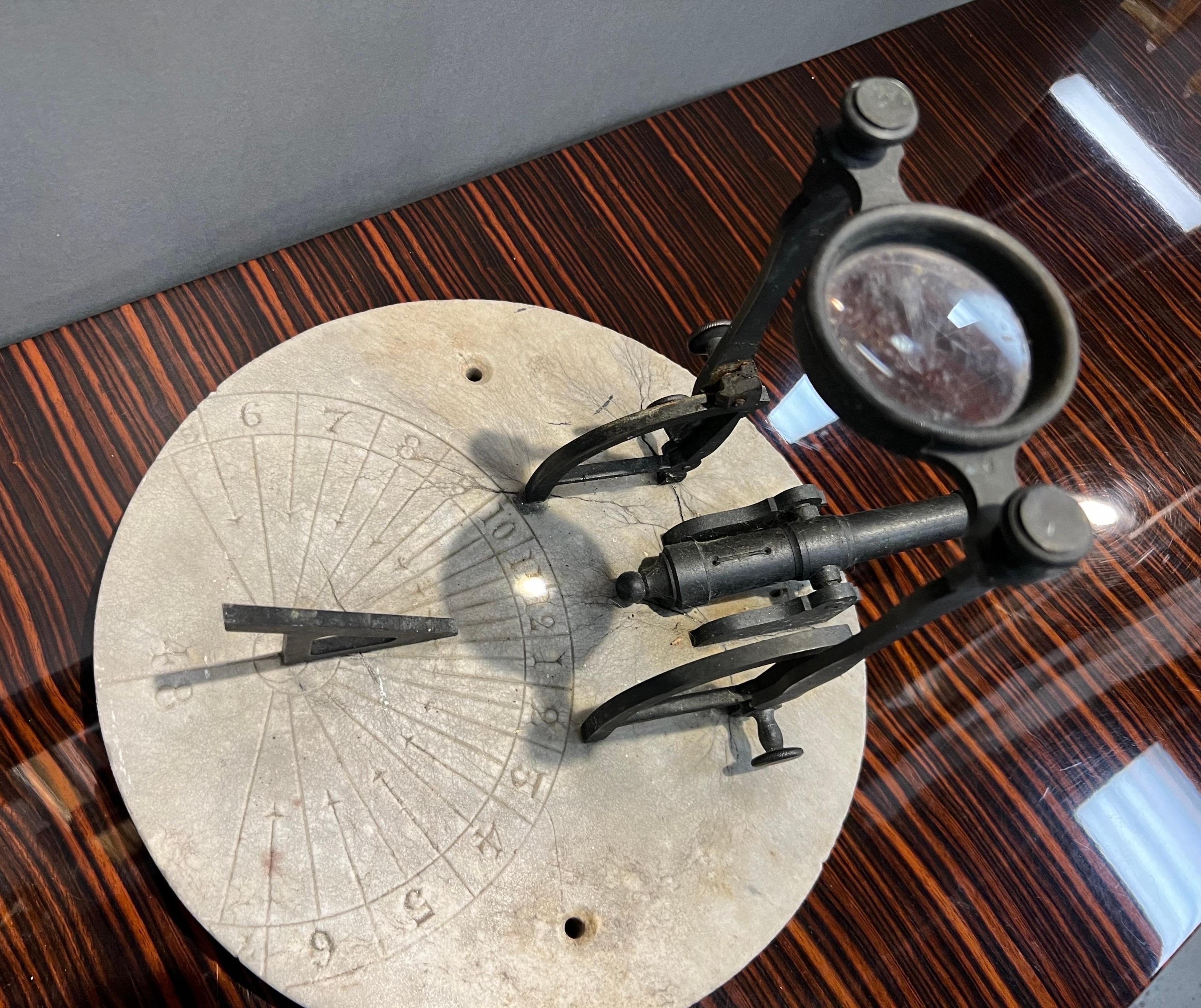 Incredibly cool 19th century solar powered signal canon marble sun dial base. This signal cannon can be set to ignite with the sun through the attached magnifying glass- which can be adjusted for different seasons or time of the day. The marble base