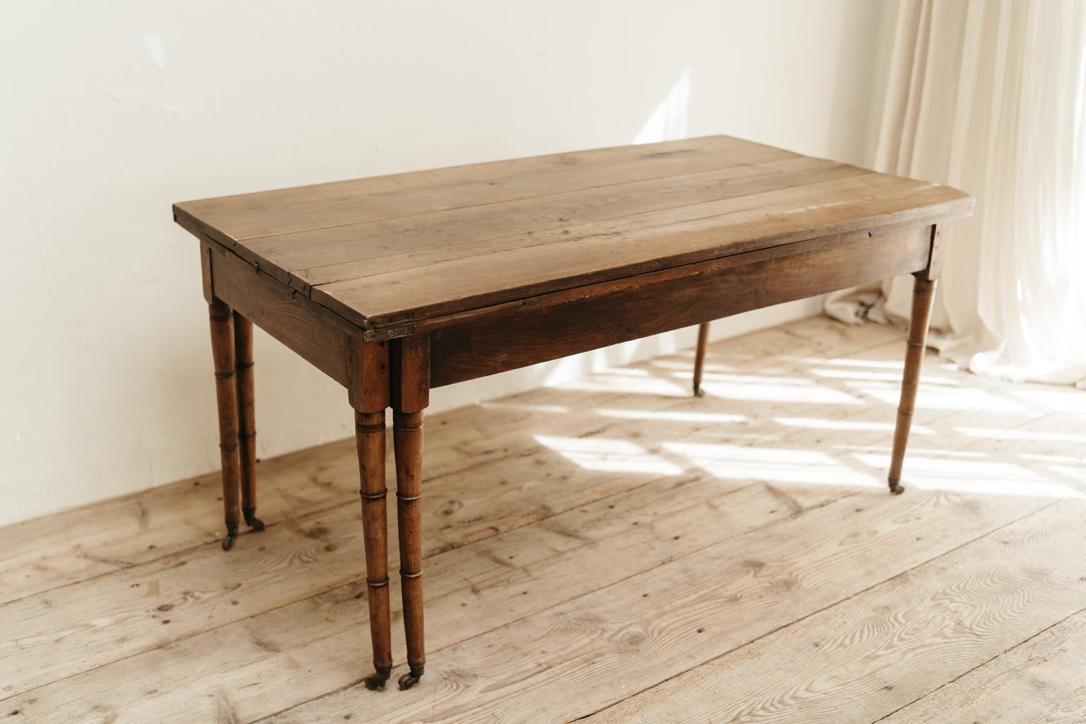 a french oak farmhouse table, closed the dimensions are 148 x 79 x 74 cm high,
open 300 cm x 79 x 71 cm high, as pure as it gets, ready to use, great patina!.
 