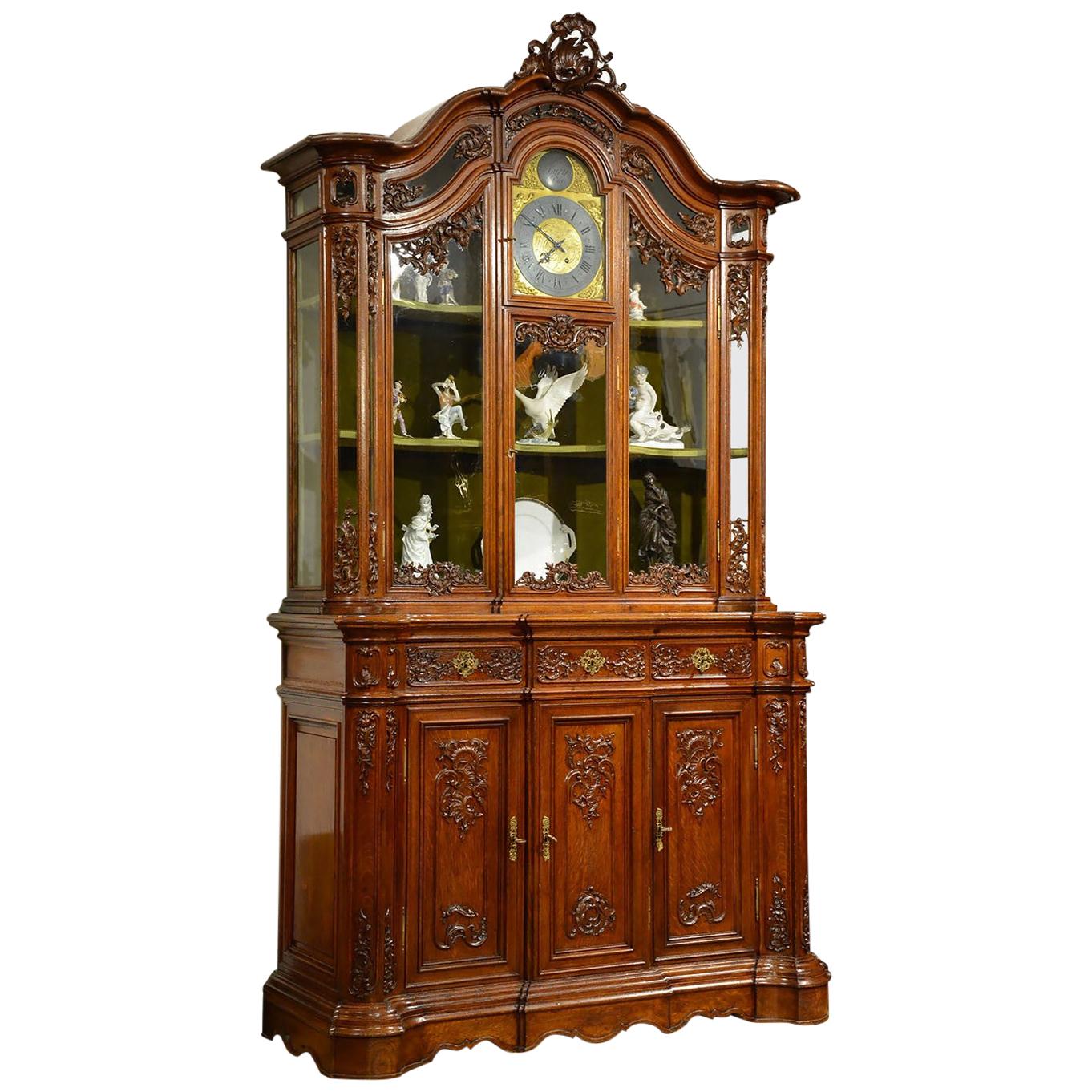 19th Century Solid Oak Rococo Style Cupboard with H Bury A Paris Clock For Sale