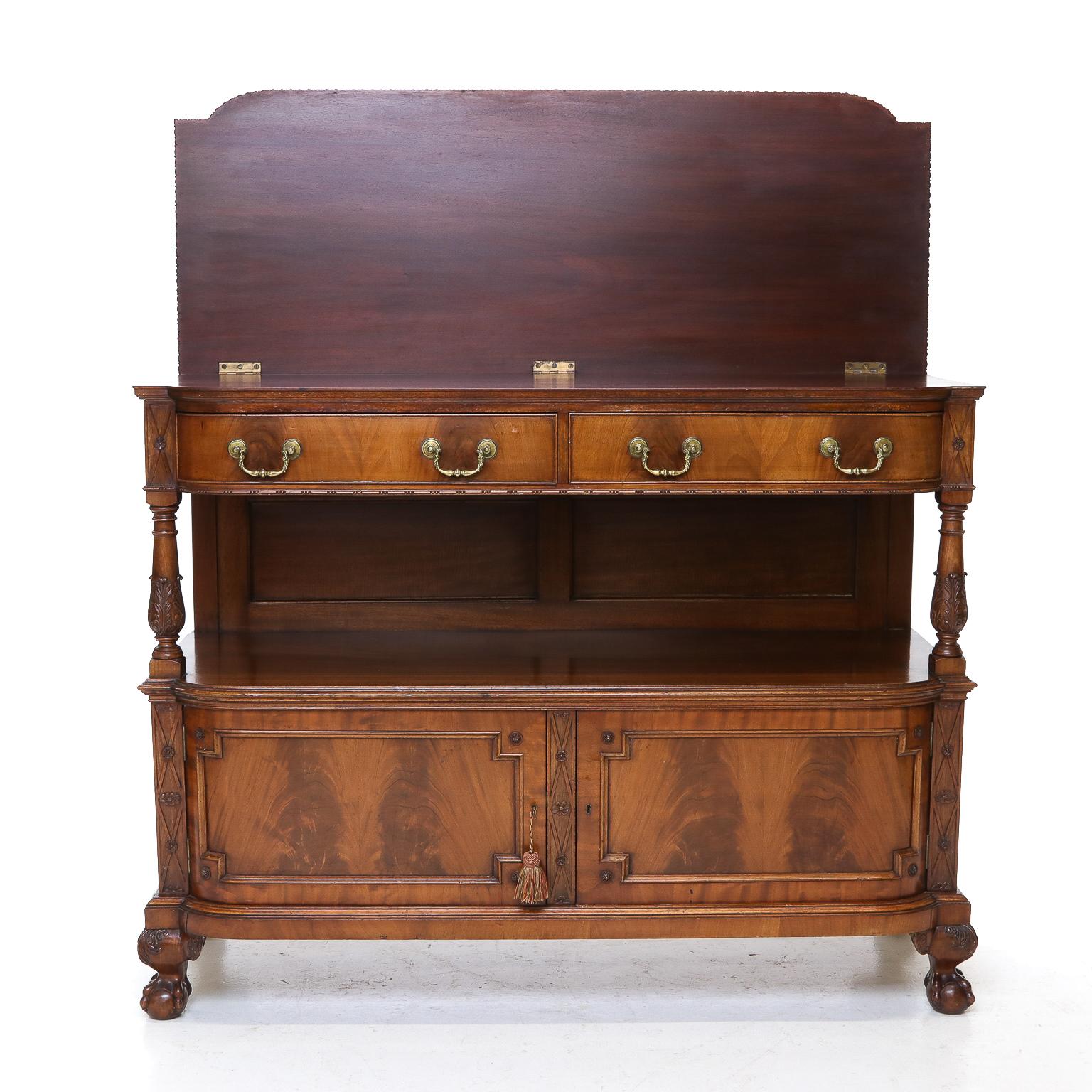 19th century Sopwith & Co. English Mahogany Server with Lift Top having two small drawers over an open cupboard with two panel cupboard doors below. The server sits atop ball and claw feet with carved knees.

Manufacturer is Sopwith & Co. out of