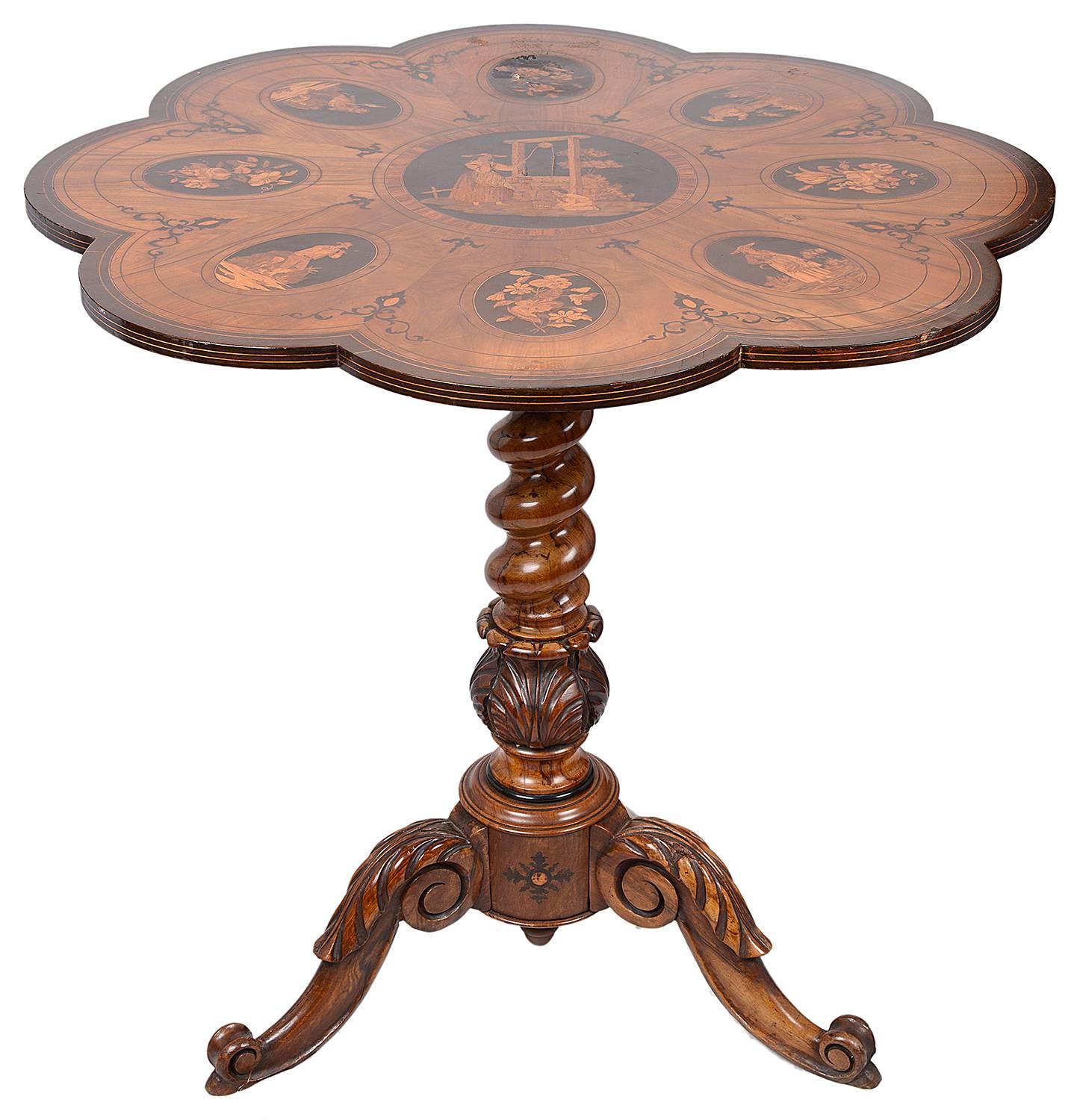 A very good quality 19th century Sorrento marquetry inlaid occasional table. Having various oval inlaid panels depicting people in rural poses and flowers. All set olivewood, tulipwood and ebony. The base with a central barley twist and raised on
