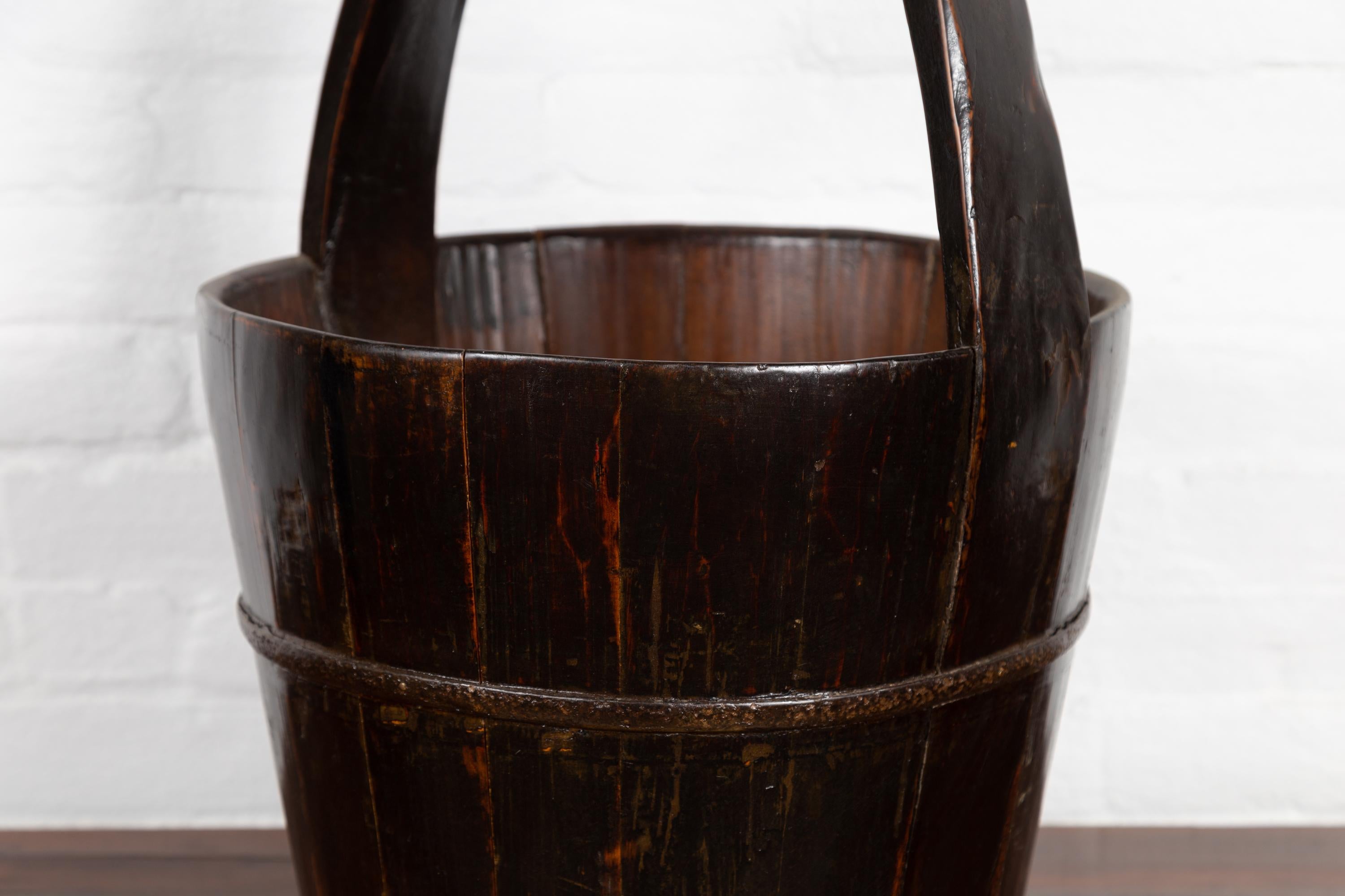 Rustic 19th Century Southern Chinese Wooden Bucket with Large Handle and Metal Accents For Sale