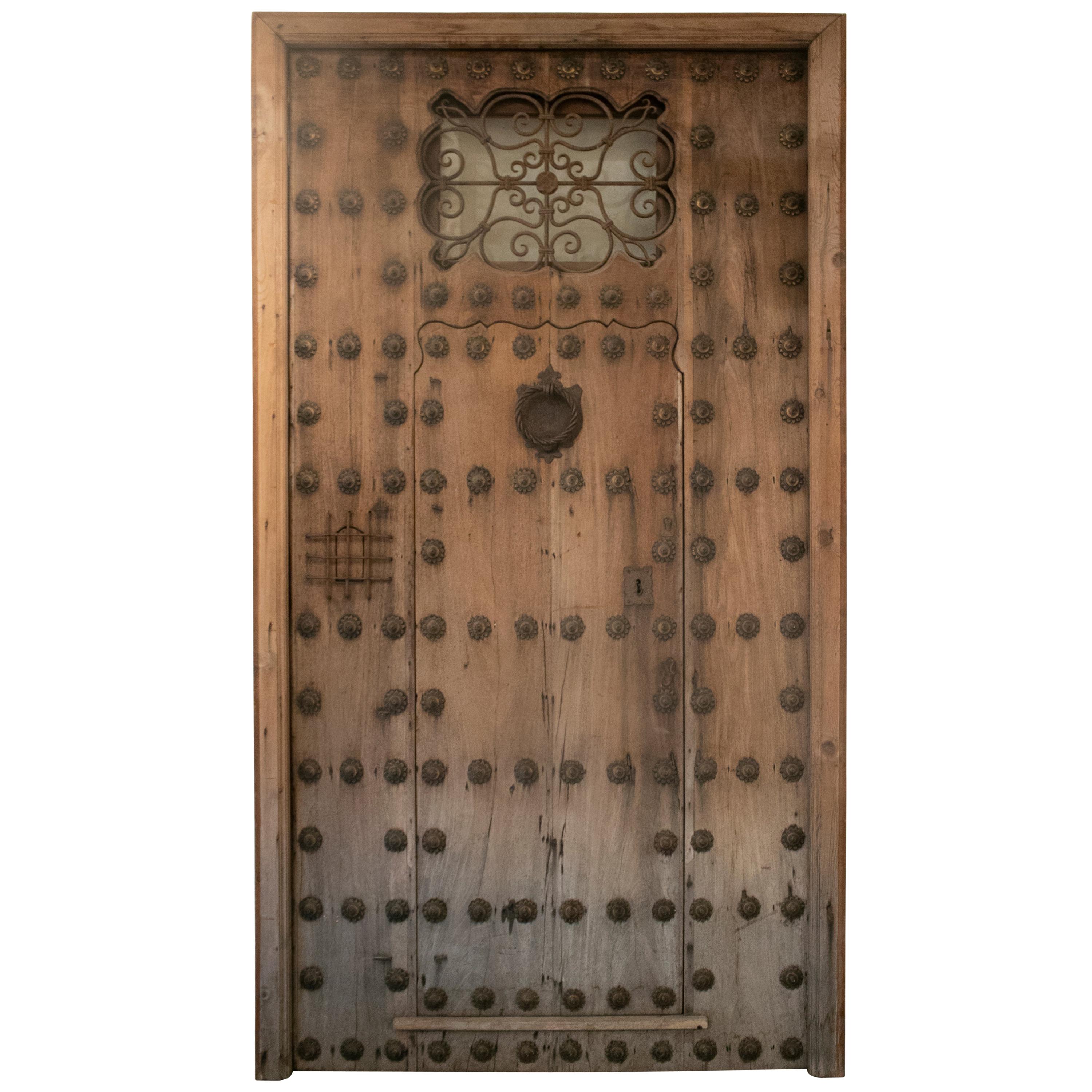 19th Century Spanish Andalusian Iron Studded Main Door w/ Frame