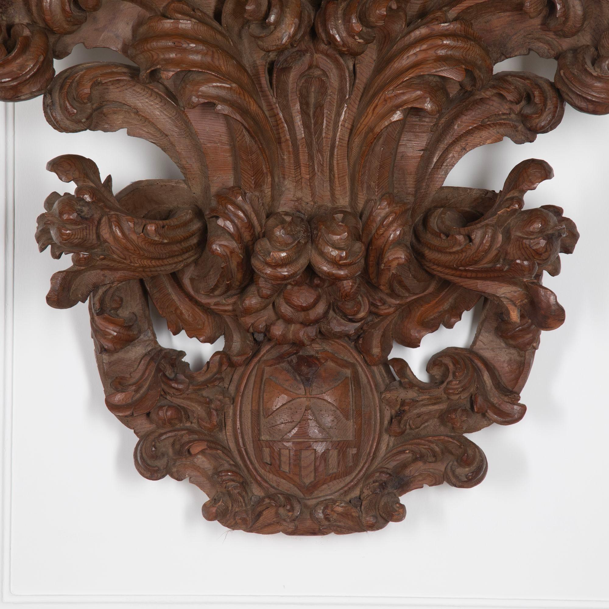 Early 19th Century Spanish armorial shield carved in a baroque style in pine.
Circa 1820.