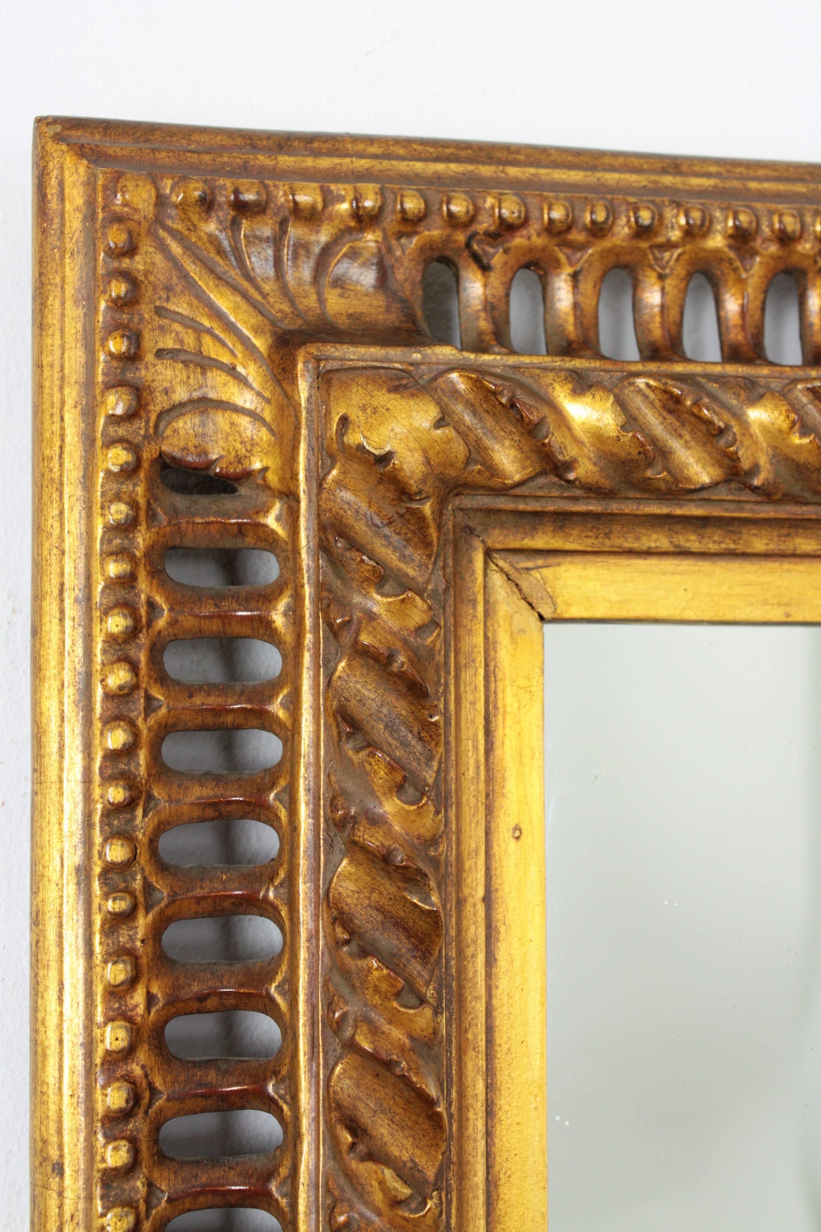 Hand-Carved 19th Century Spanish Baroque Carved Giltwood Mirror with Reticulated Frame