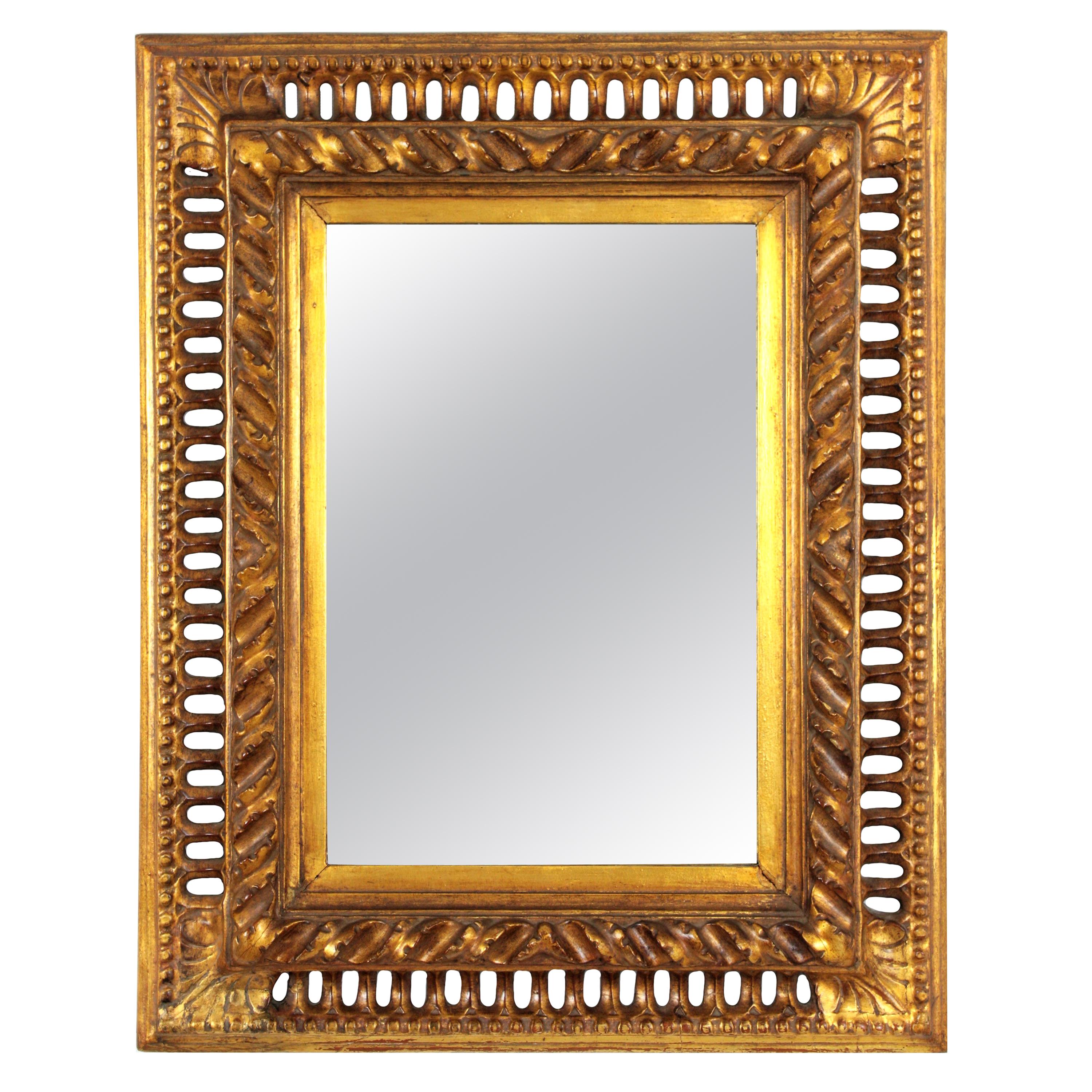 19th Century Spanish Baroque Carved Giltwood Mirror with Reticulated Frame