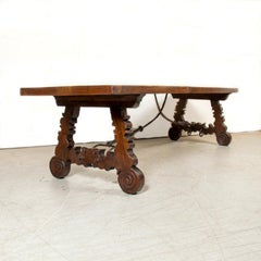 19th Century Spanish Baroque Carved Oak Trestle Dining Table with Iron Stretcher