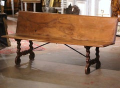 19th Century Spanish Baroque Carved Walnut Bench with Wrought Iron Stretcher